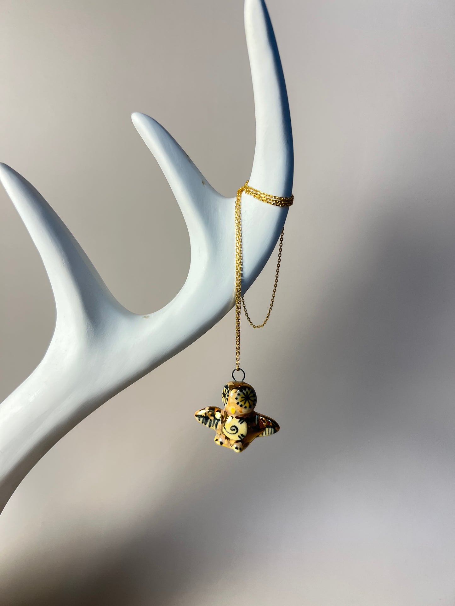 Ceramic Owl Pendant Necklace – Hand-Painted with Gold Luster & Spiral Symbol