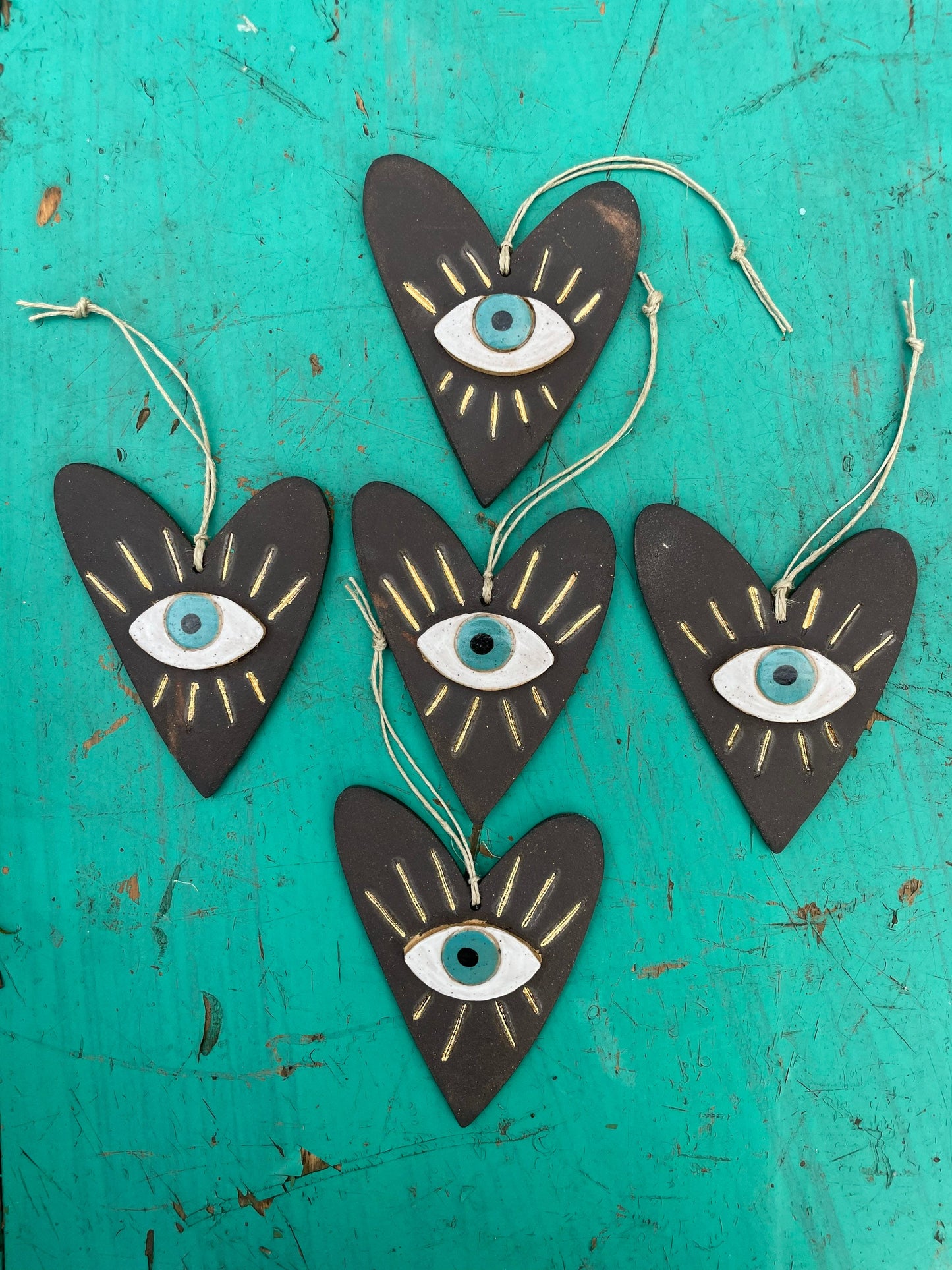 Handmade ceramic heart with evil eye charm
