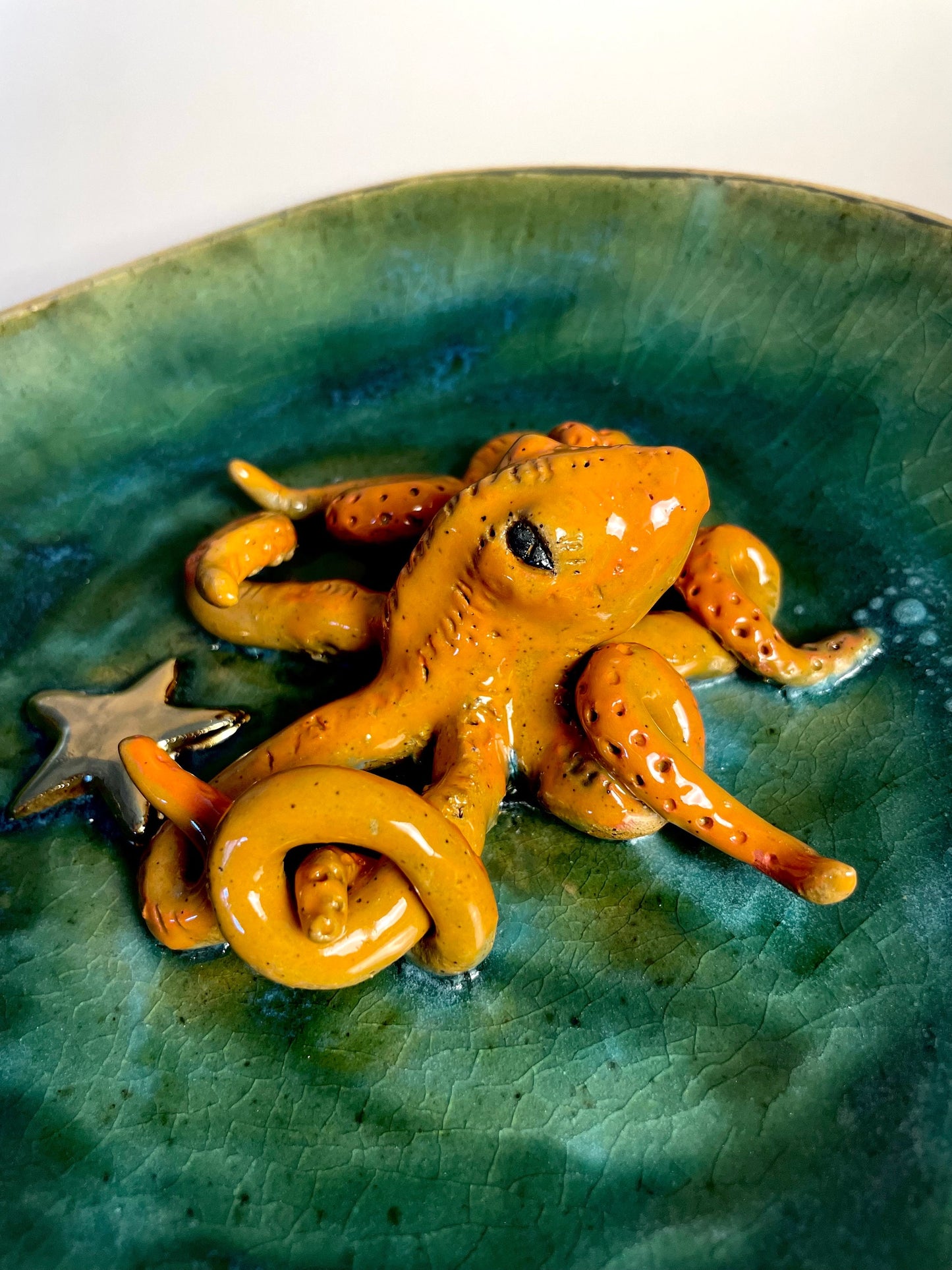 Handmade ceramic Octopus in dish with Gold Star