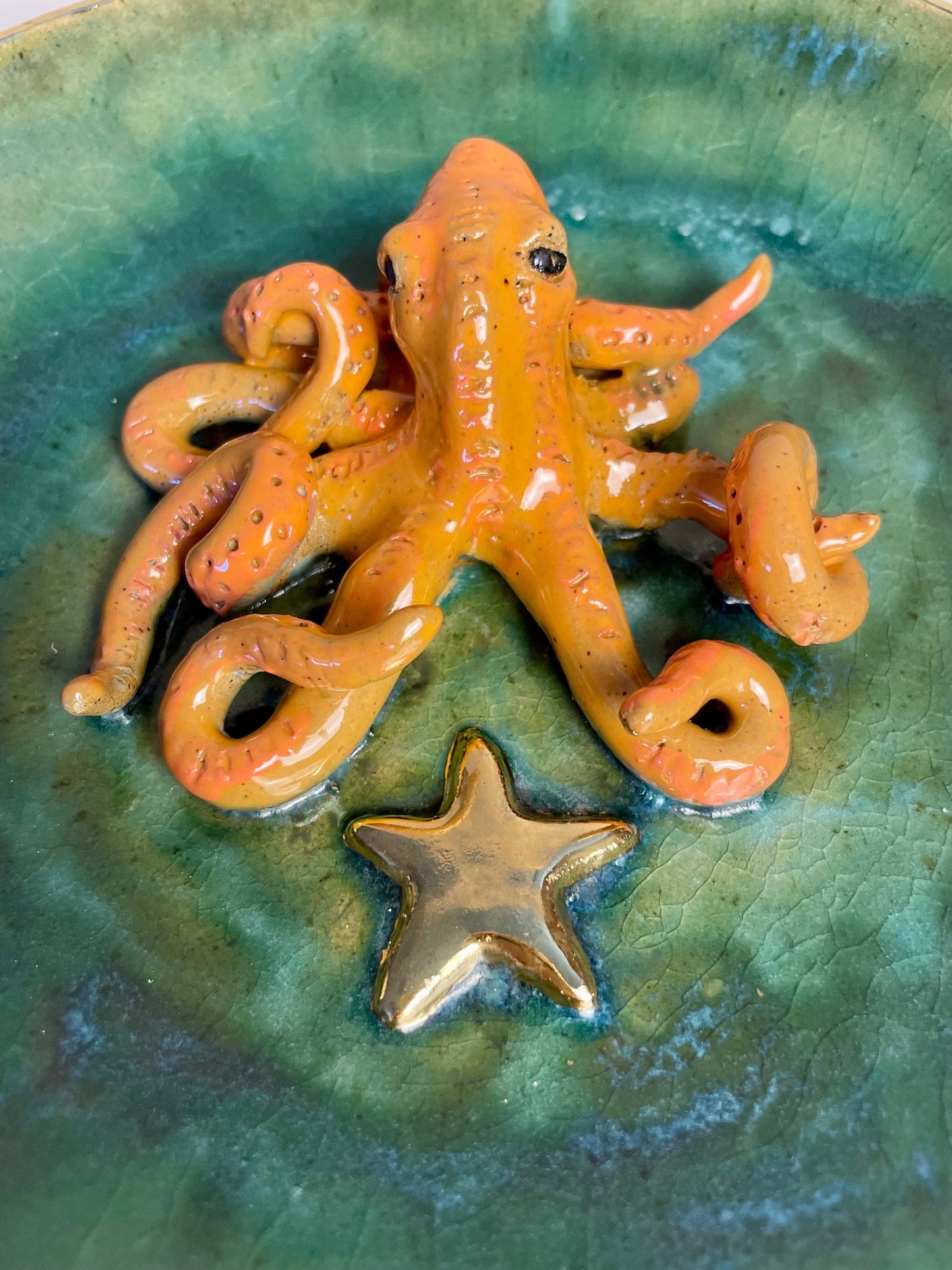 Handmade ceramic Octopus in dish with Gold Star