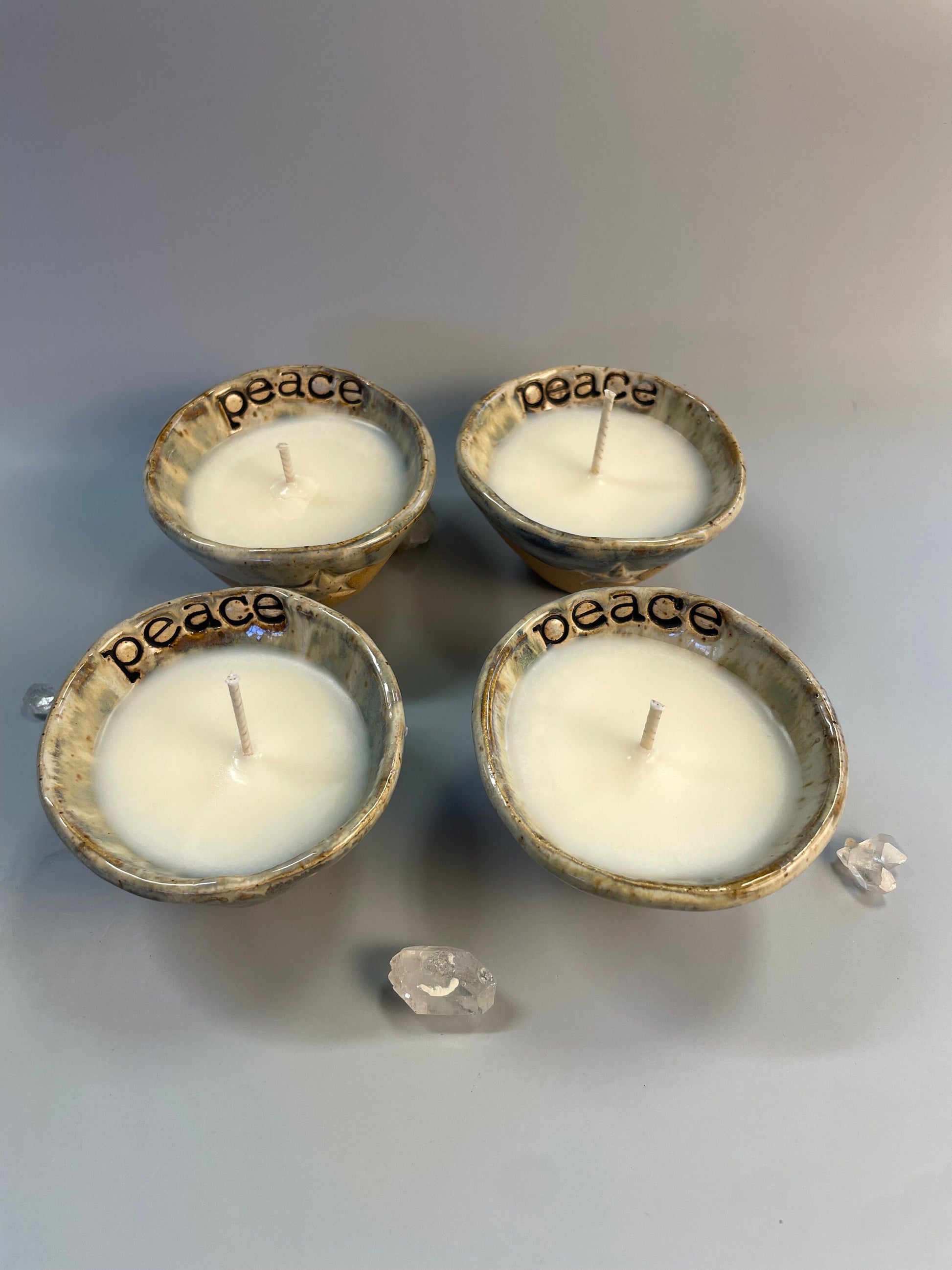 Handmade ceramic PEACE candles with star
