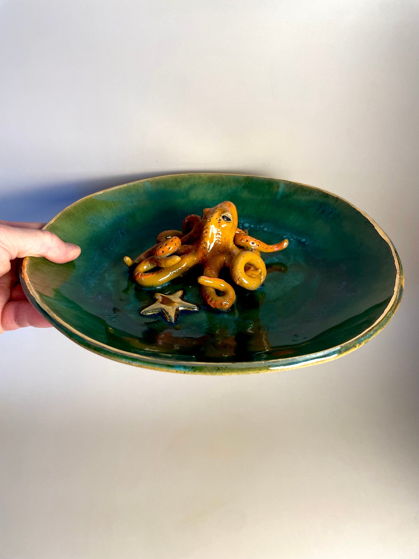 Handmade ceramic Octopus in dish with Gold Star