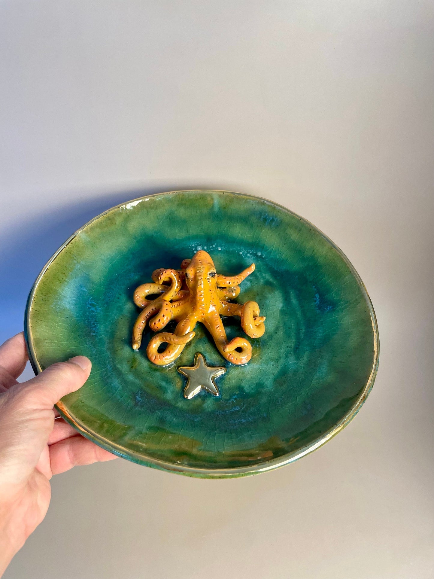 Handmade ceramic Octopus in dish with Gold Star