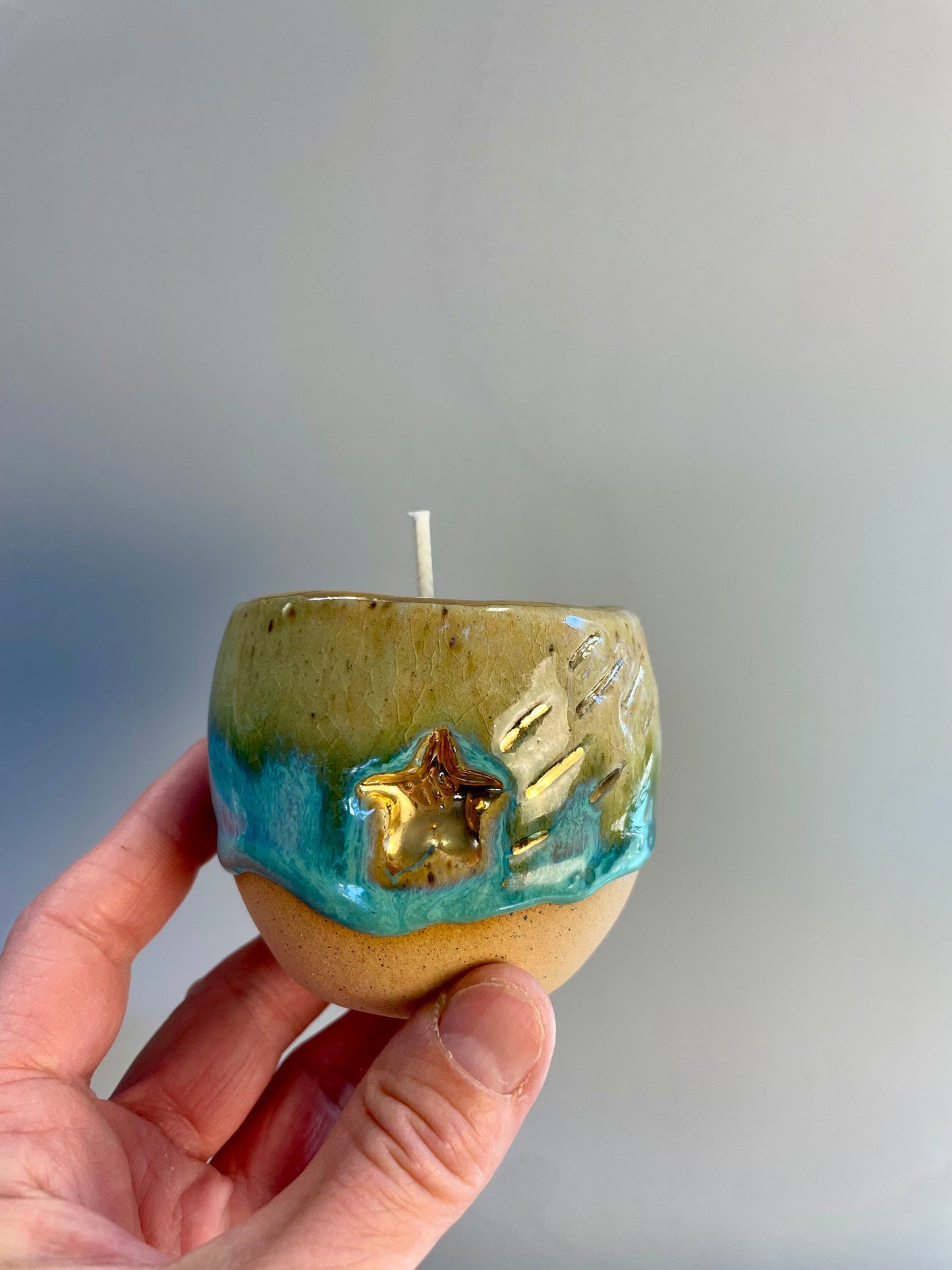 Ceramic shooting star carved candle vessel