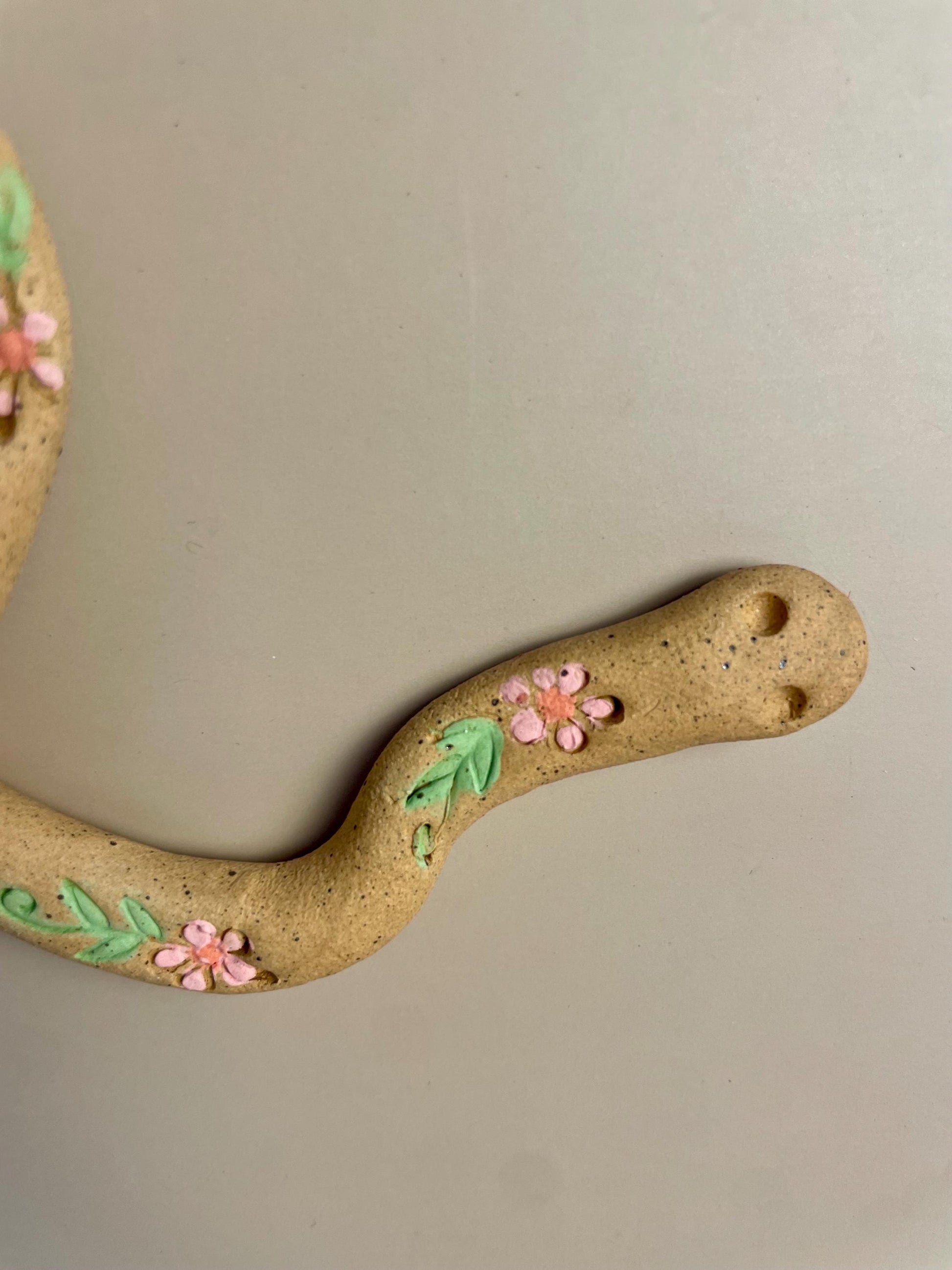 Handmade ceramic pink flower hanging Snake Talisman