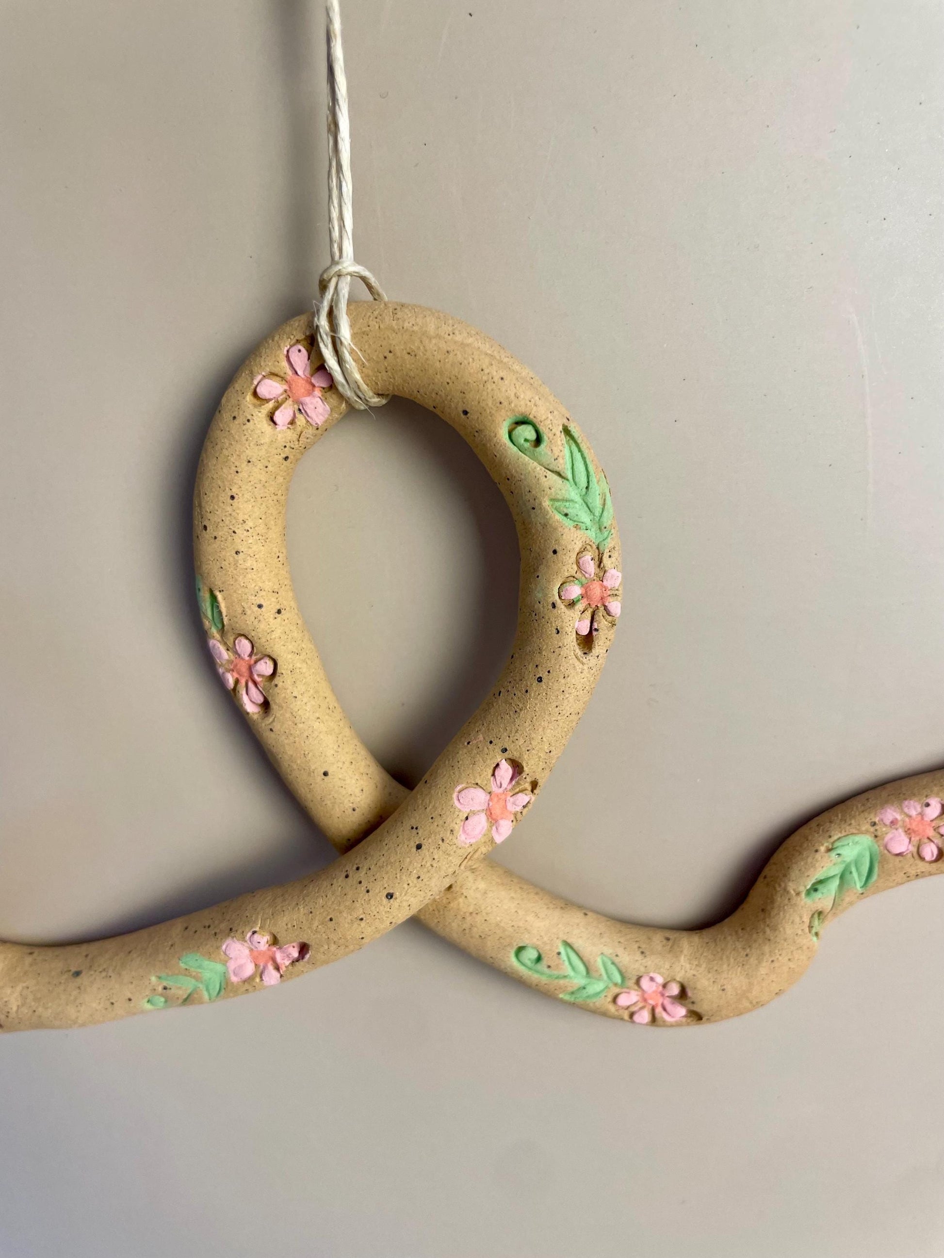Handmade ceramic pink flower hanging Snake Talisman