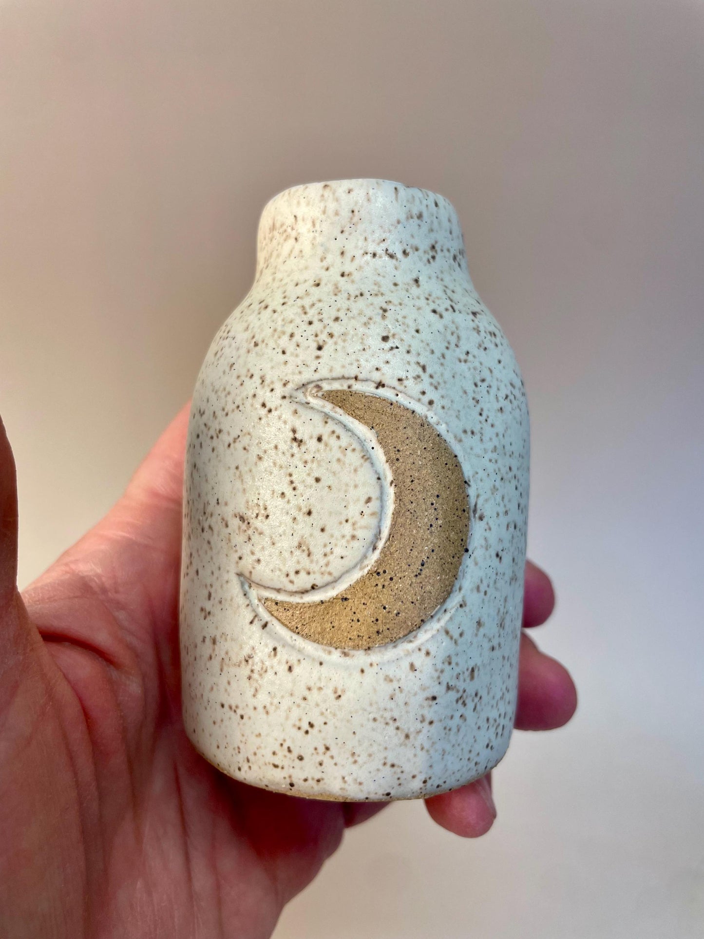 Handmade ceramic oatmeal crescent moon bottle