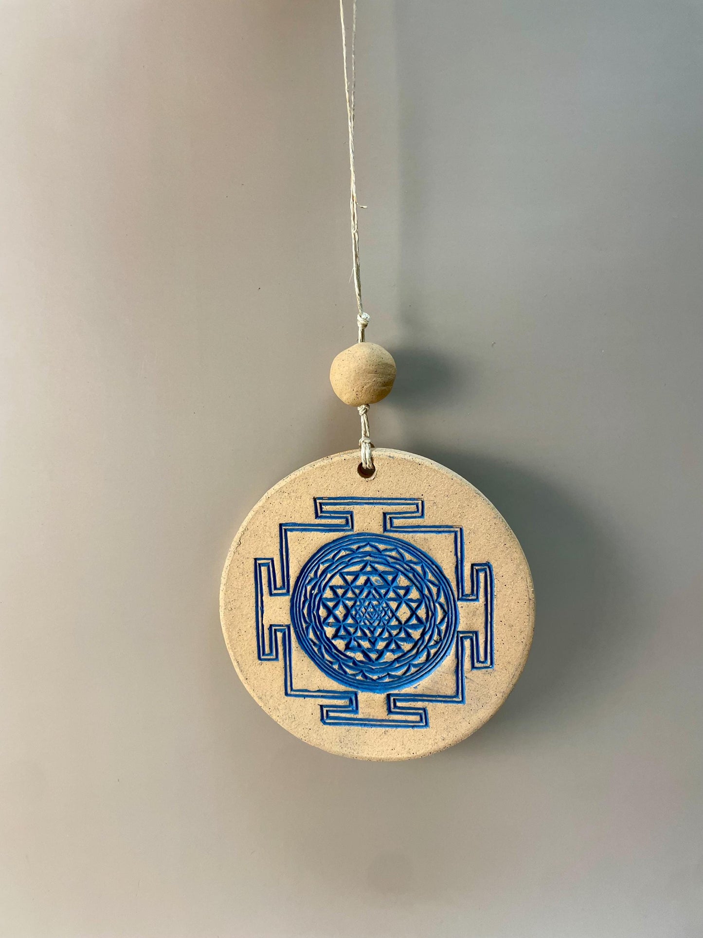 Sri Yantra indigo ceramic wall hanging