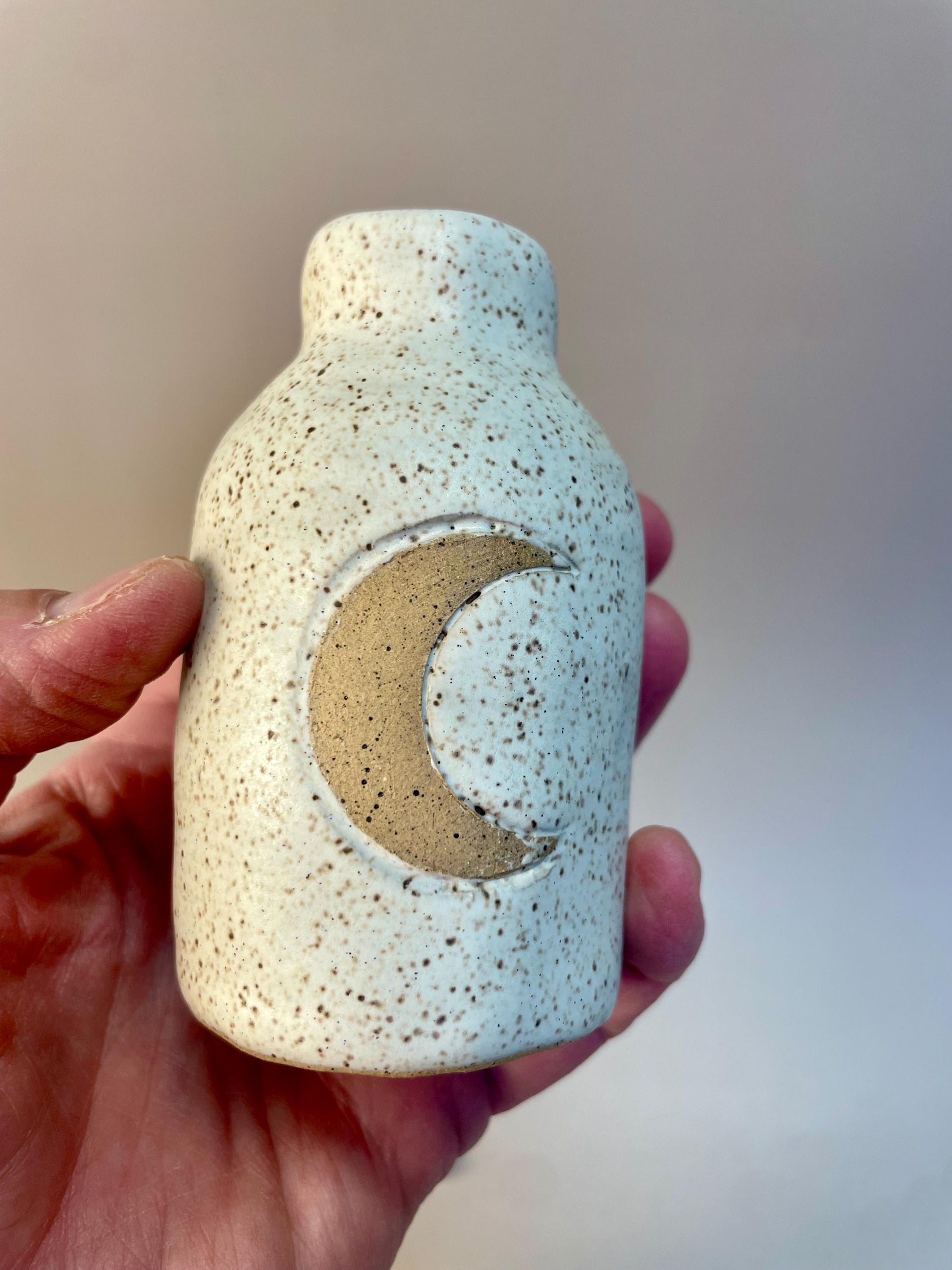 Handmade ceramic oatmeal crescent moon bottle