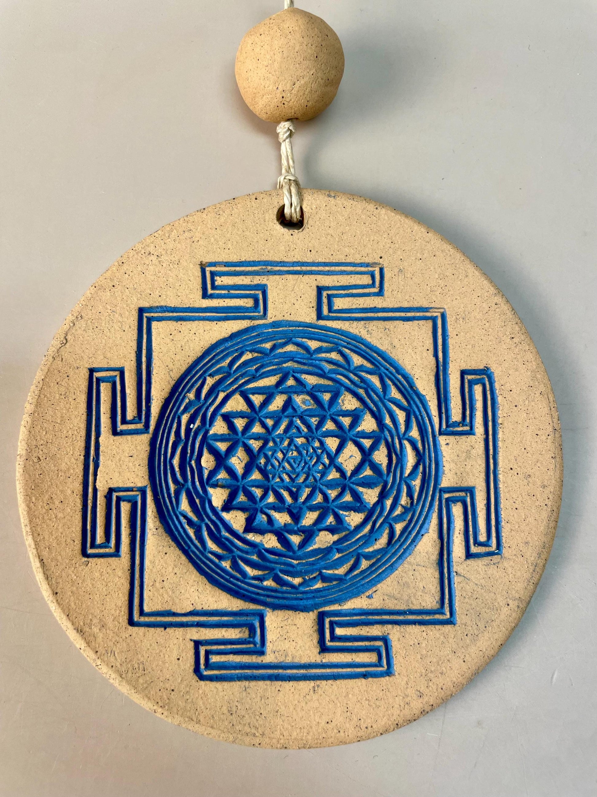 Sri Yantra indigo ceramic wall hanging