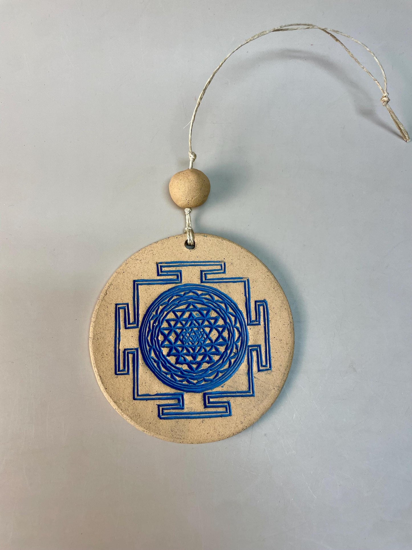 Sri Yantra indigo ceramic wall hanging