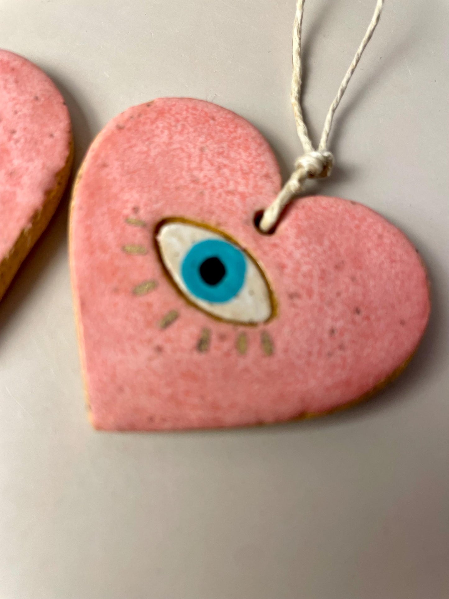 Handmade ceramic heart with eye charms