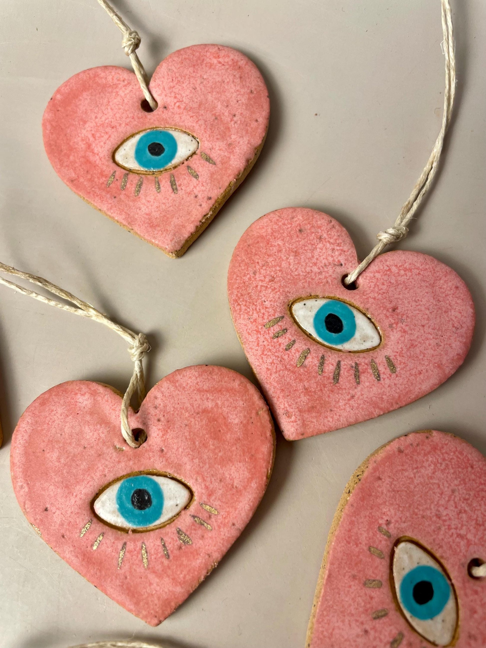 Handmade ceramic heart with eye charms