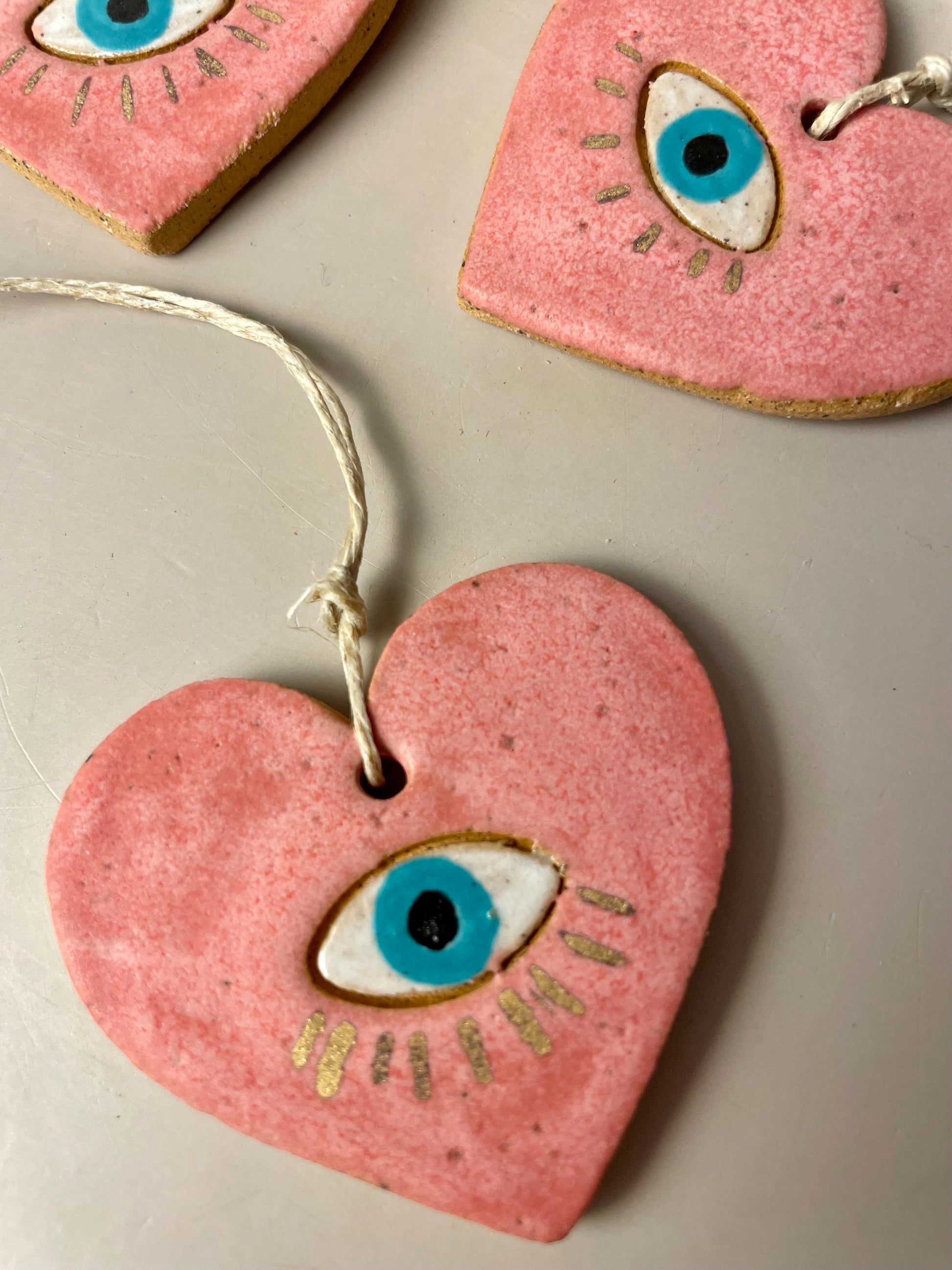 Handmade ceramic heart with eye charms