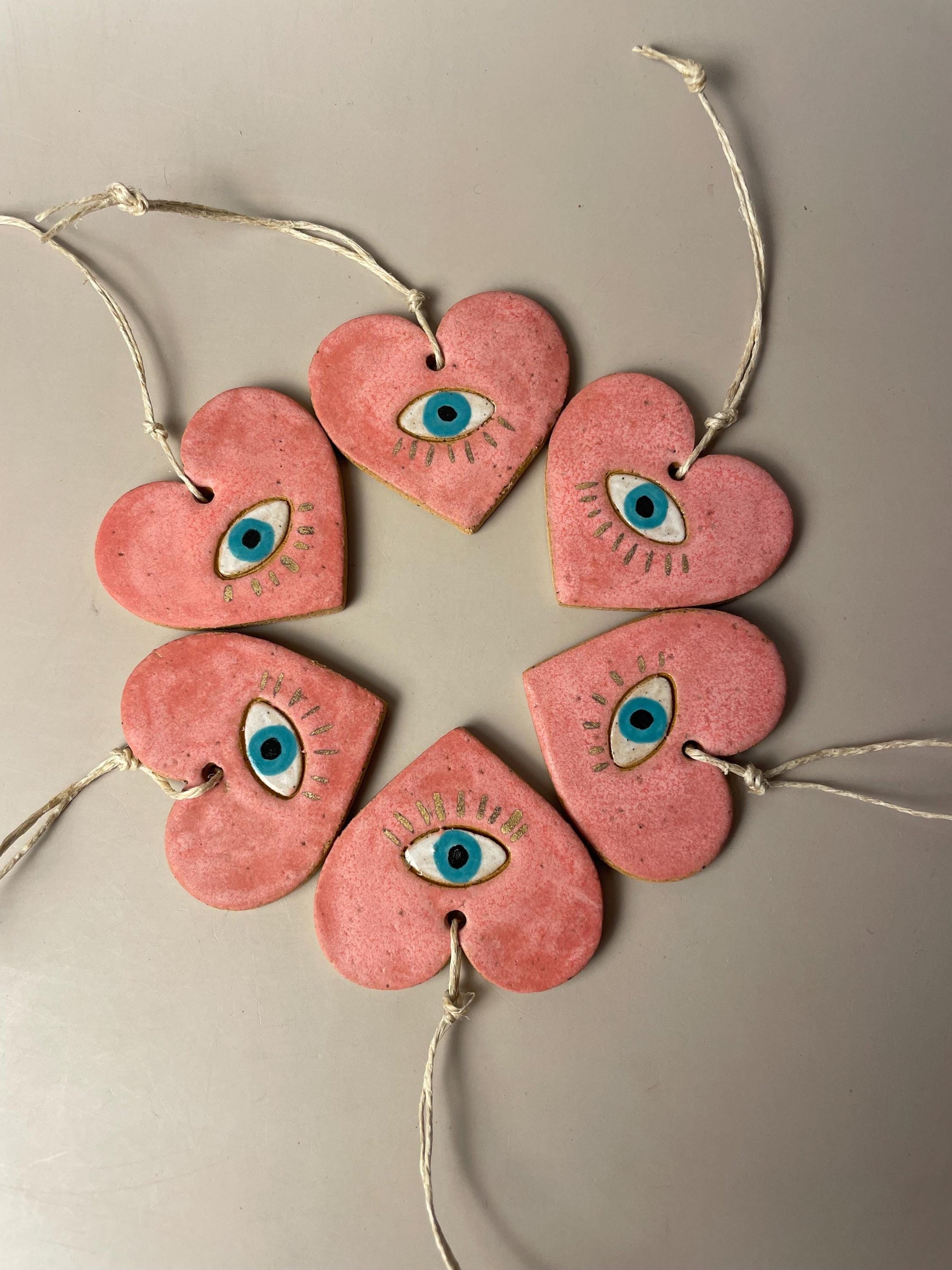 Handmade ceramic heart with eye charms