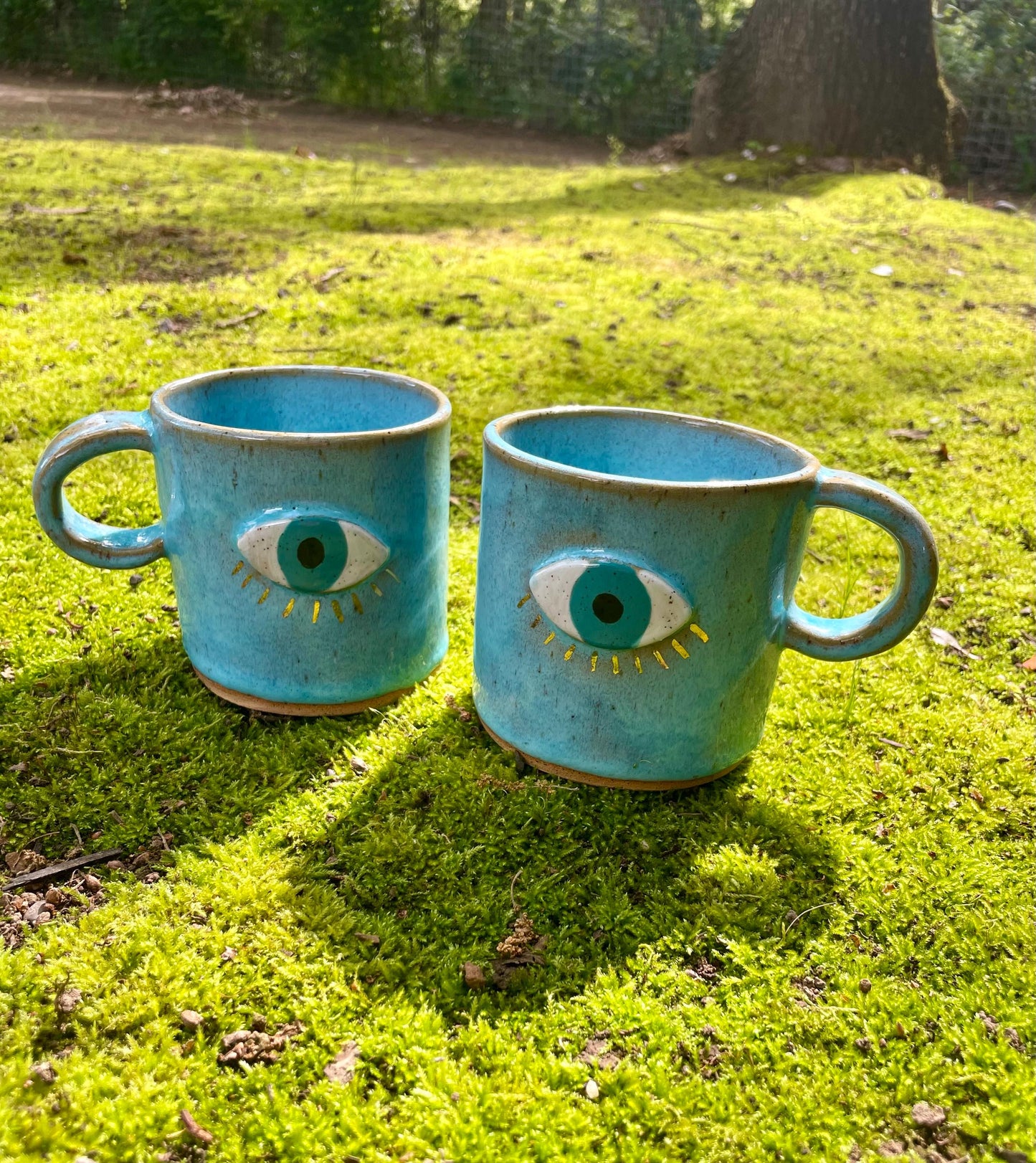 Handmade ceramic aqua evil eye mug with gold luster