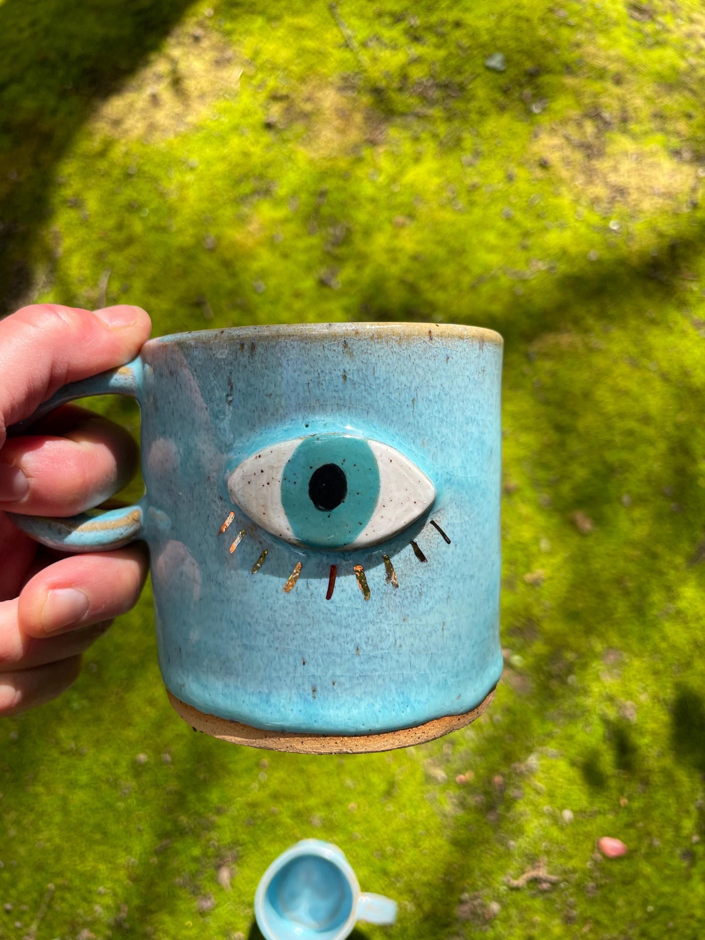 Handmade ceramic aqua evil eye mug with gold luster