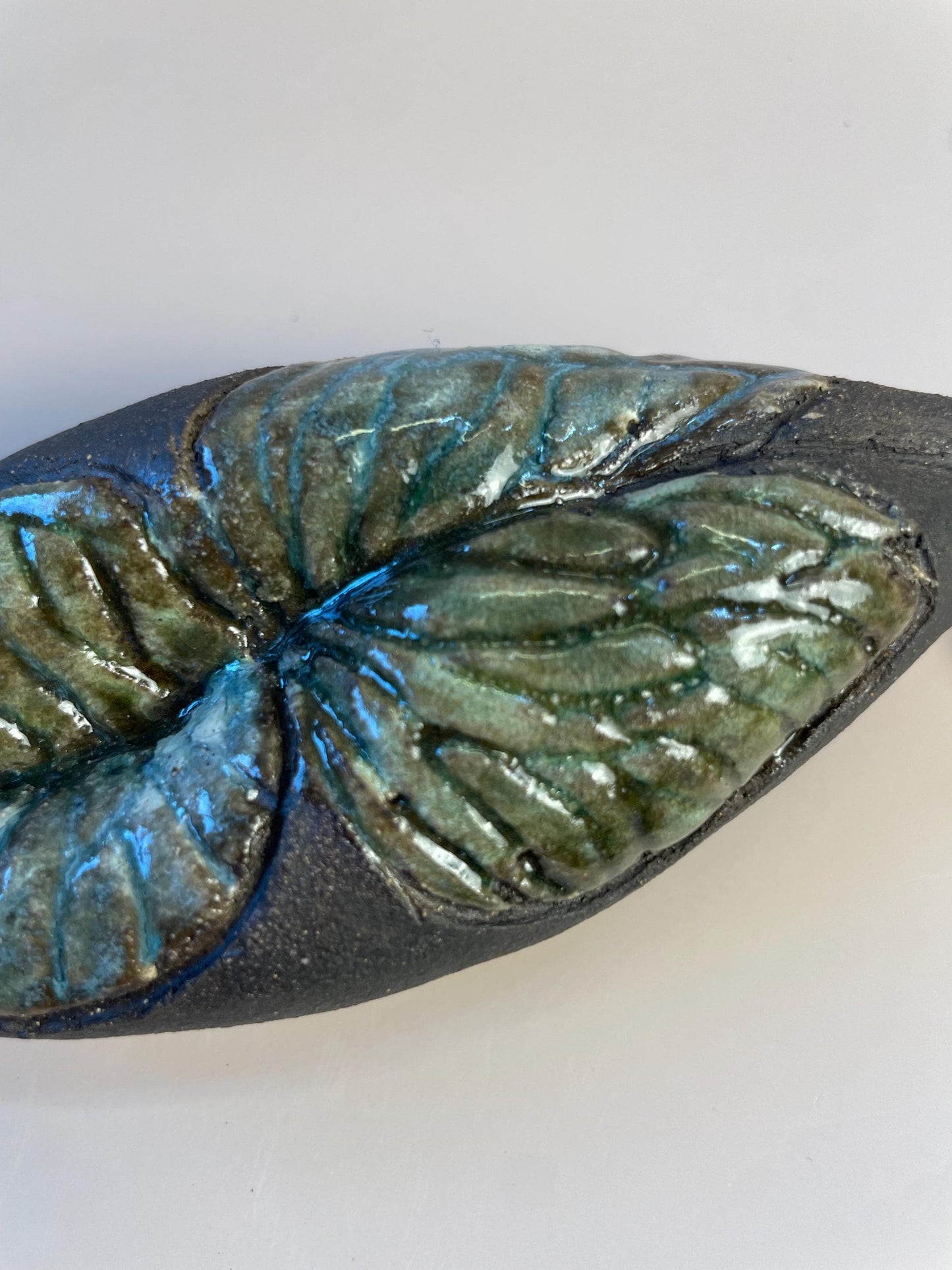 Handmade ceramic carved clay winged leaf rattle