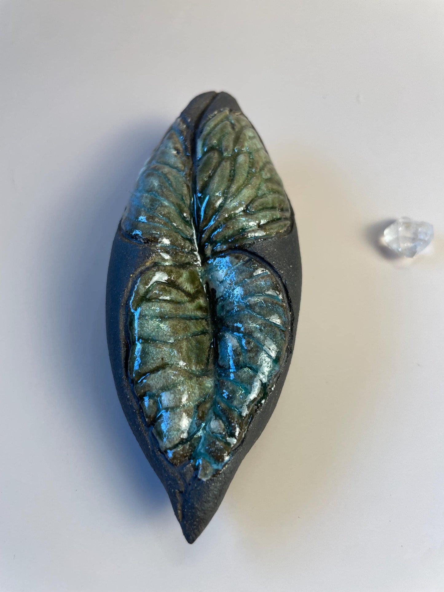 Handmade ceramic carved clay winged leaf rattle