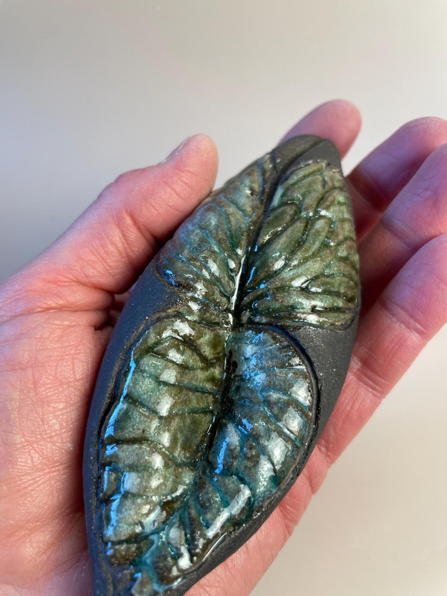 Handmade ceramic carved clay winged leaf rattle