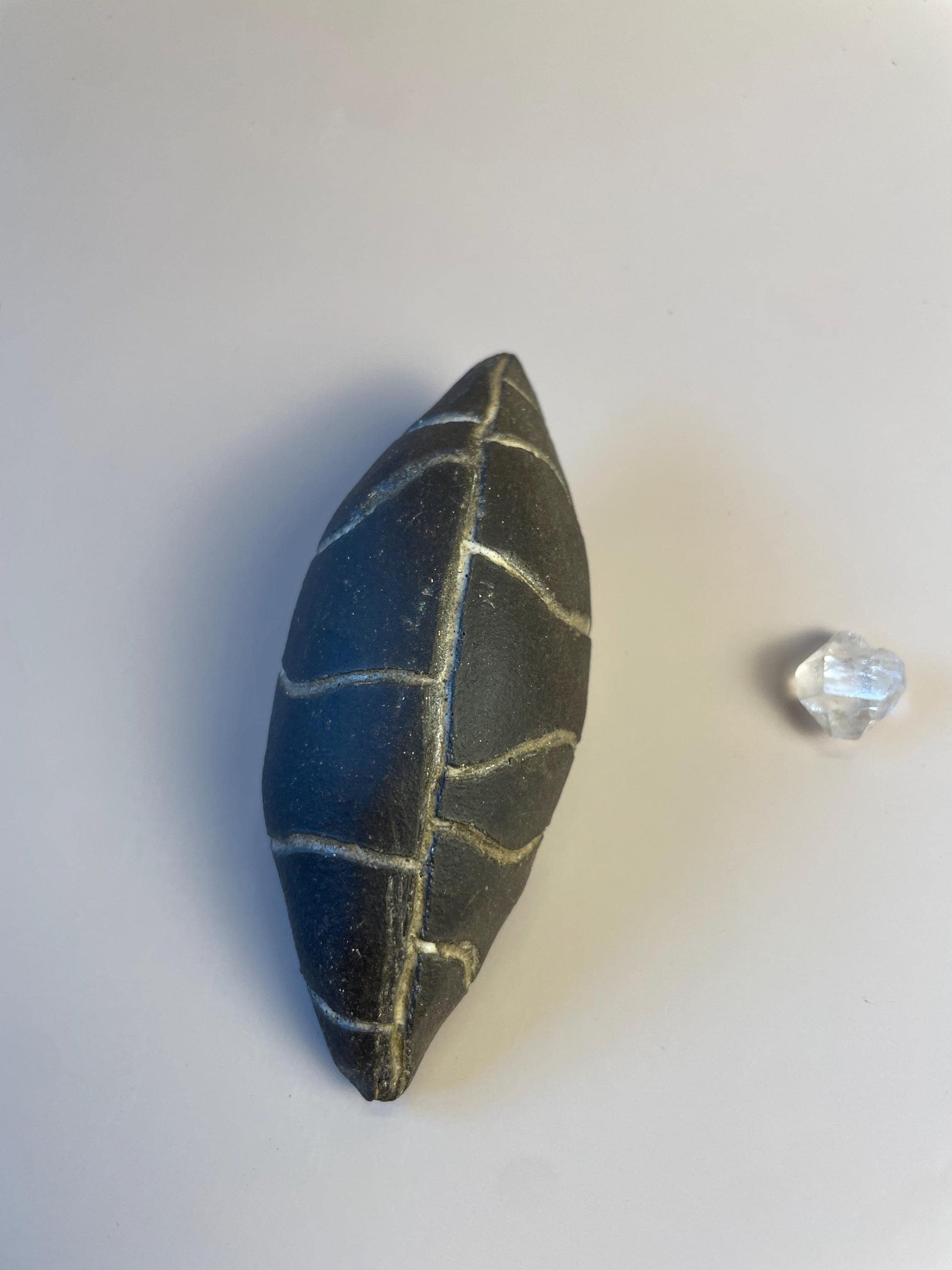 Handmade ceramic carved clay leaf rattle