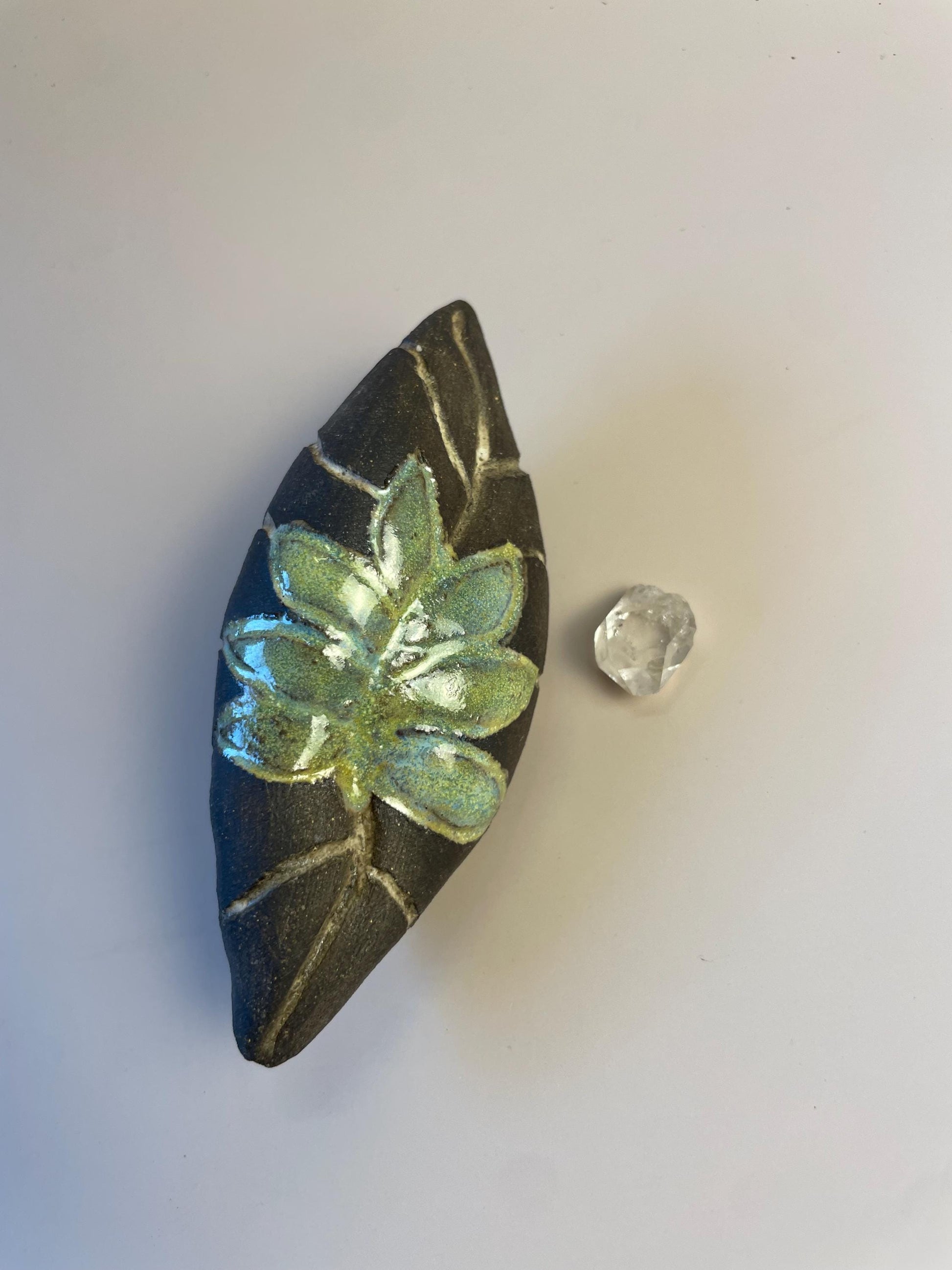 Handmade ceramic carved clay leaf rattle