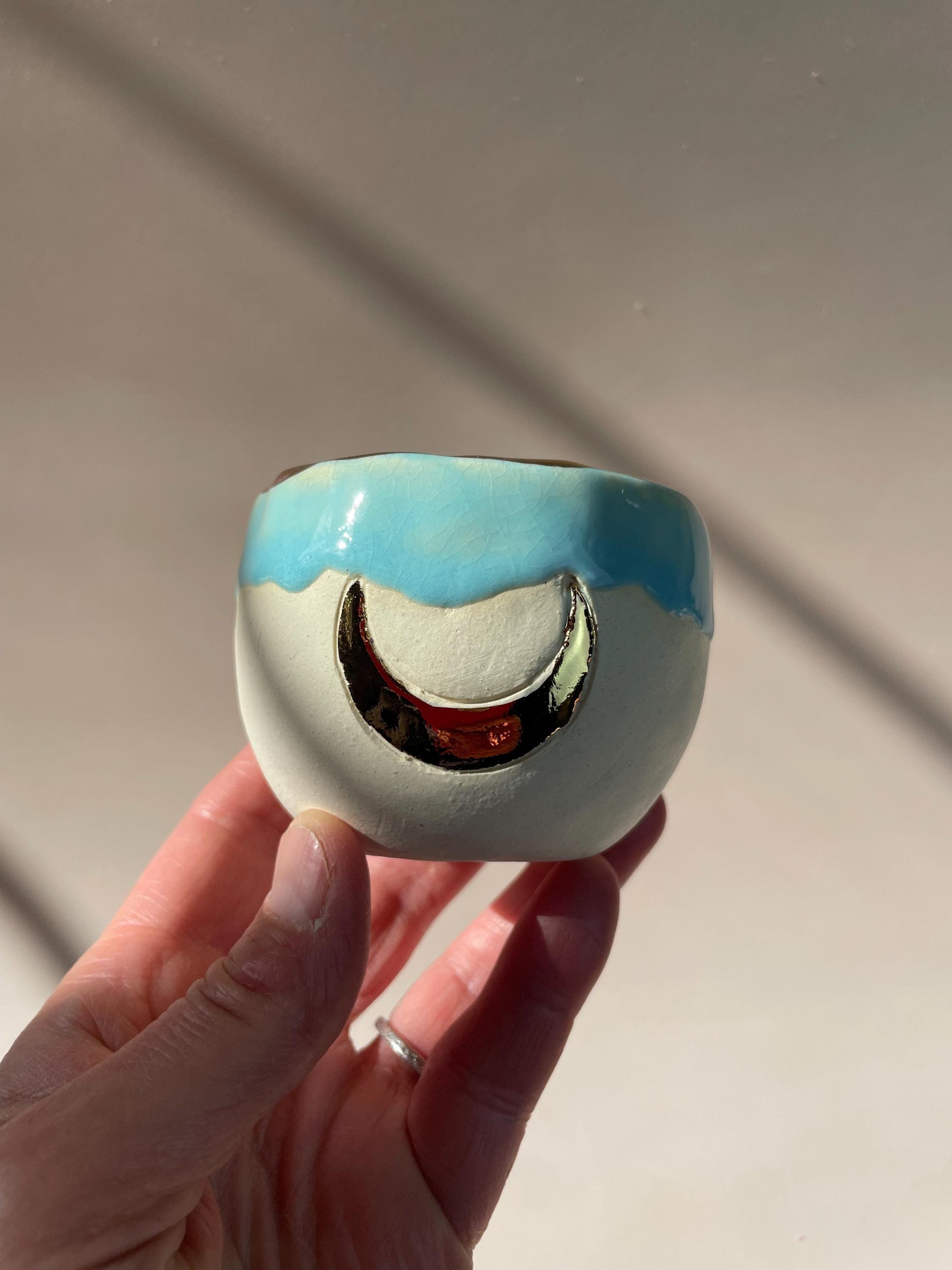 Handmade ceramic aqua gold crescent moon cup