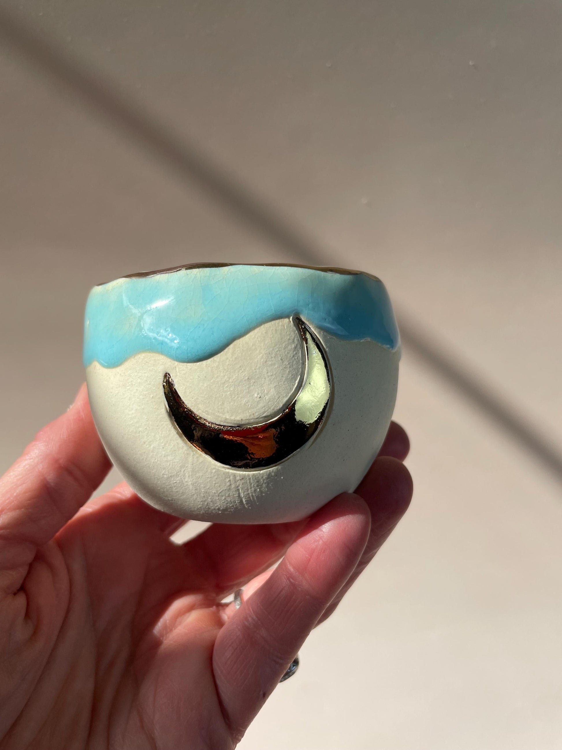 Handmade ceramic aqua gold crescent moon cup