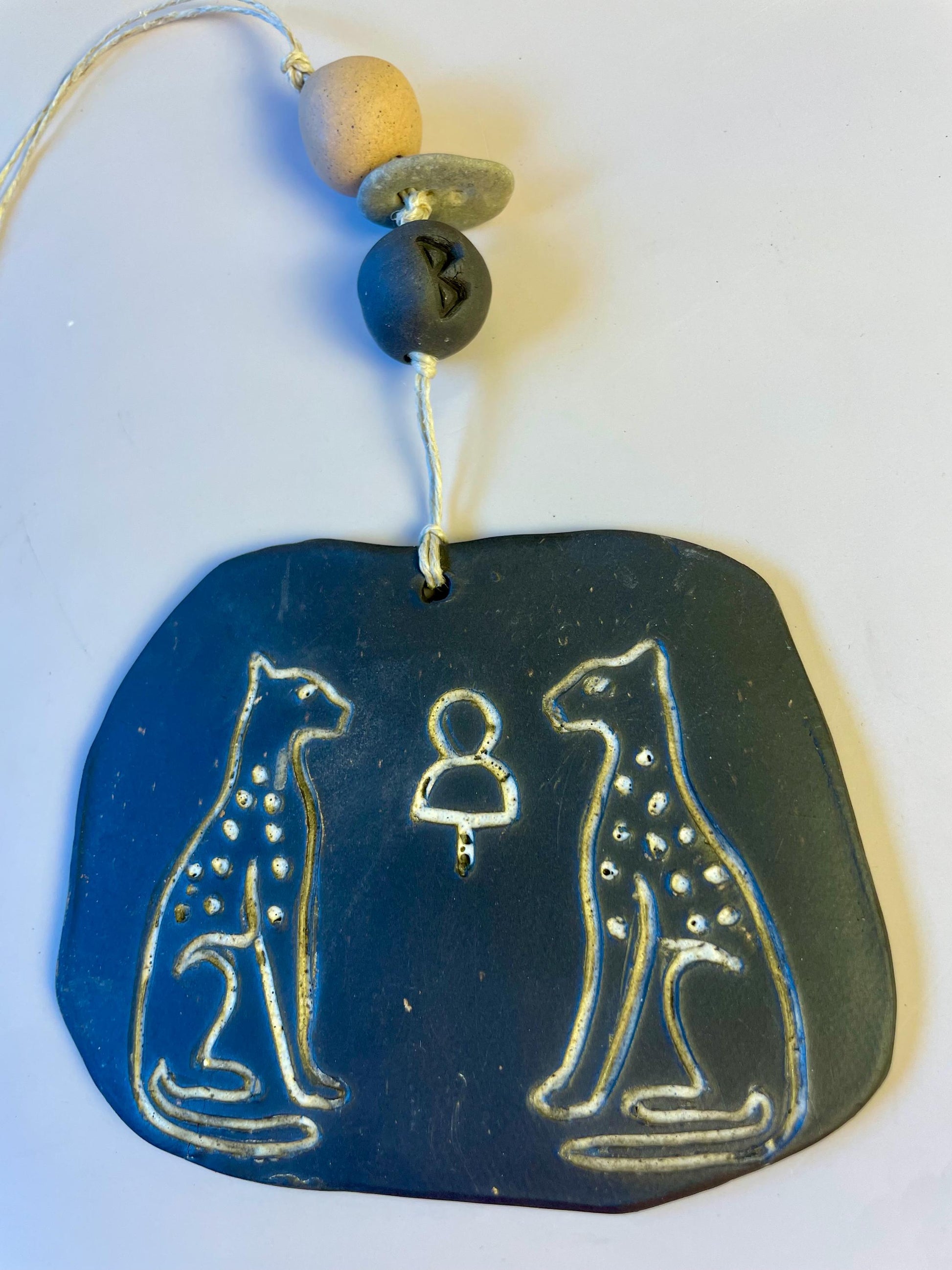 Inanna’s Guardians | Ceramic Wall Talisman with Cheetahs, Berkana Rune Bead & Hag Stone