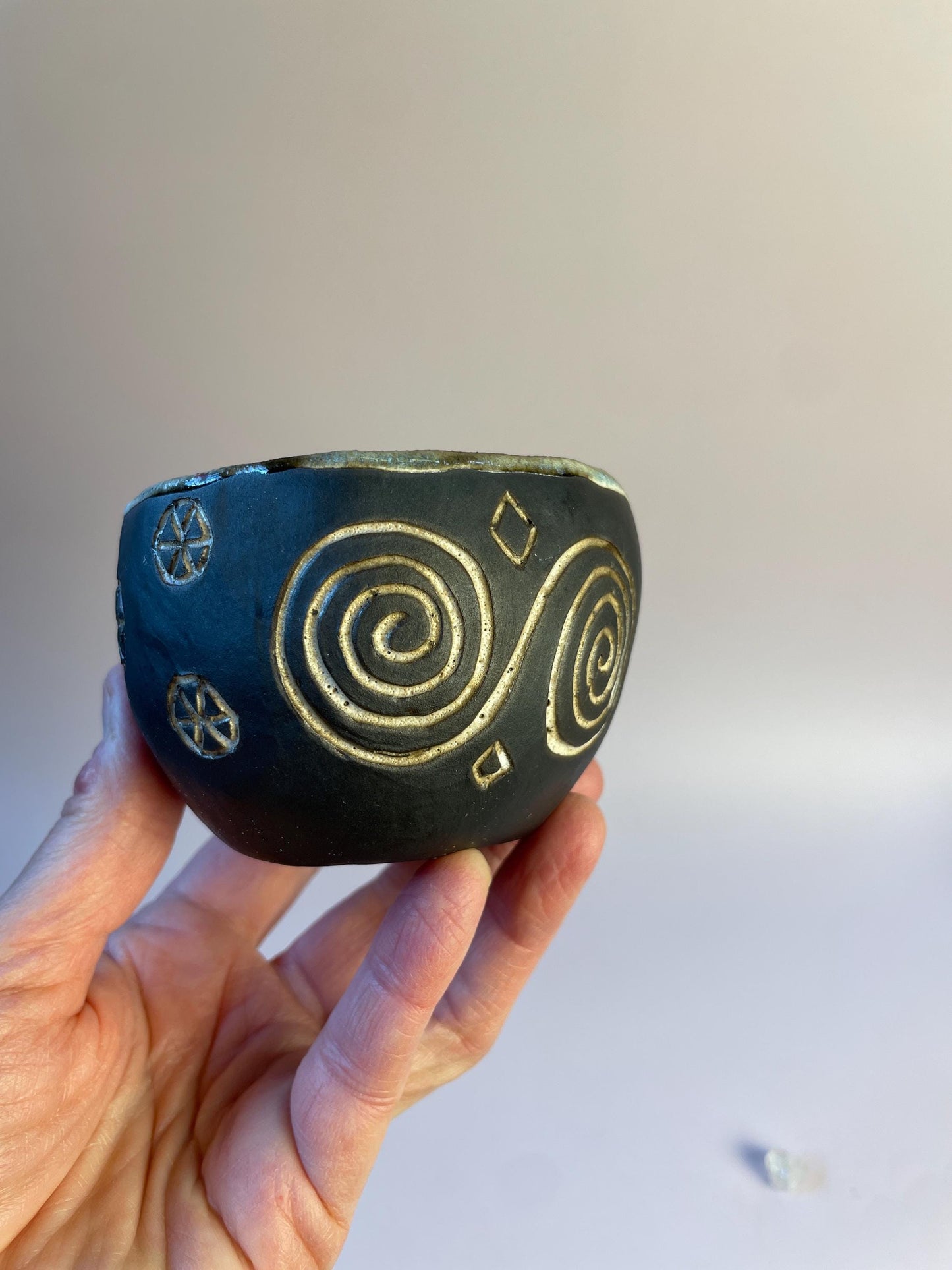 Winter Solstice Candle in Hand Carved Newgrange Vessel – Dark Clay Ritual Candle, Fragrance-Free, Non-Toxic Apricot Wax, Celtic Spiral