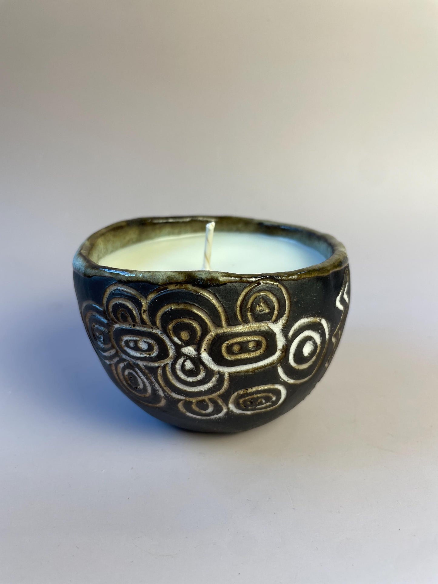 Winter Solstice Candle in Hand Carved Newgrange Vessel – Dark Clay Ritual Candle, Fragrance-Free, Non-Toxic Apricot Wax, Celtic Spiral