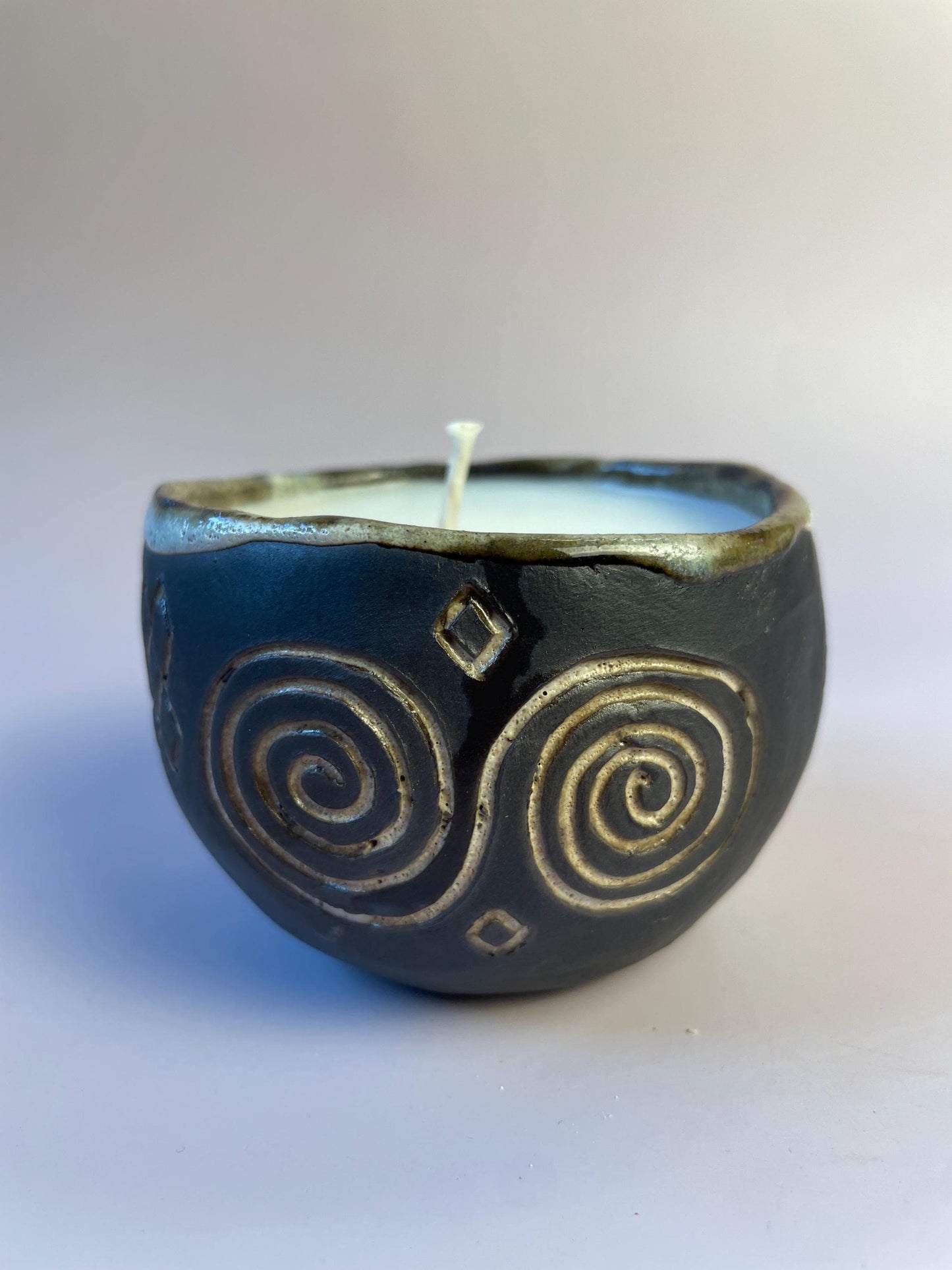 Handmade Ceramic Carved Newgrange Vessel – Dark Clay Ritual Candle, Fragrance-Free, Non-Toxic Apricot Wax, Celtic Spiral