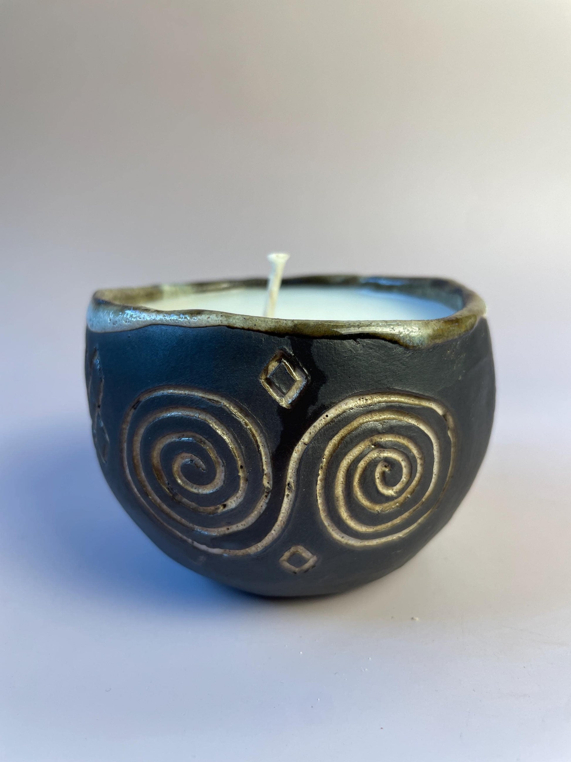 Handmade Ceramic Carved Newgrange Vessel – Dark Clay Ritual Candle, Fragrance-Free, Non-Toxic Apricot Wax, Celtic Spiral