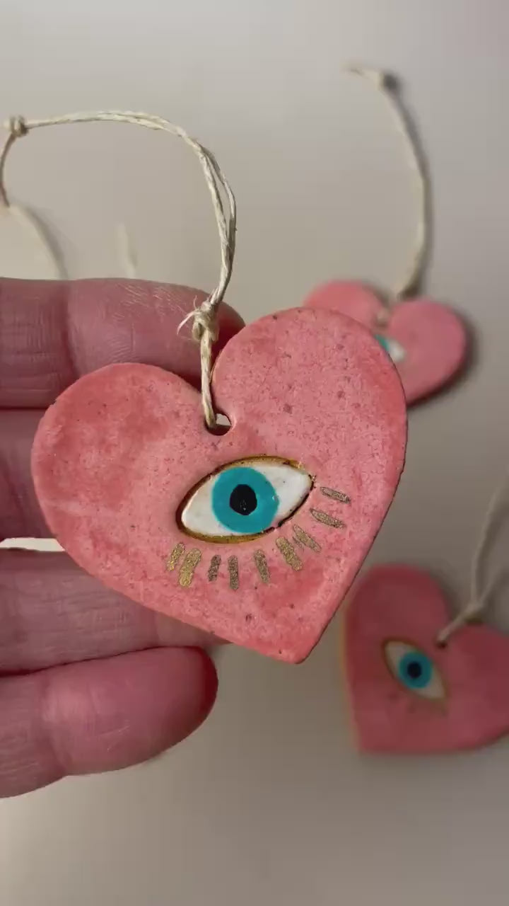 Handmade ceramic heart with eye charms