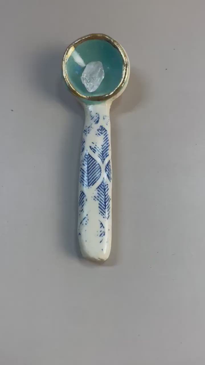 Handmade ceramic aqua and blue leaf spoon with gold luster rim.