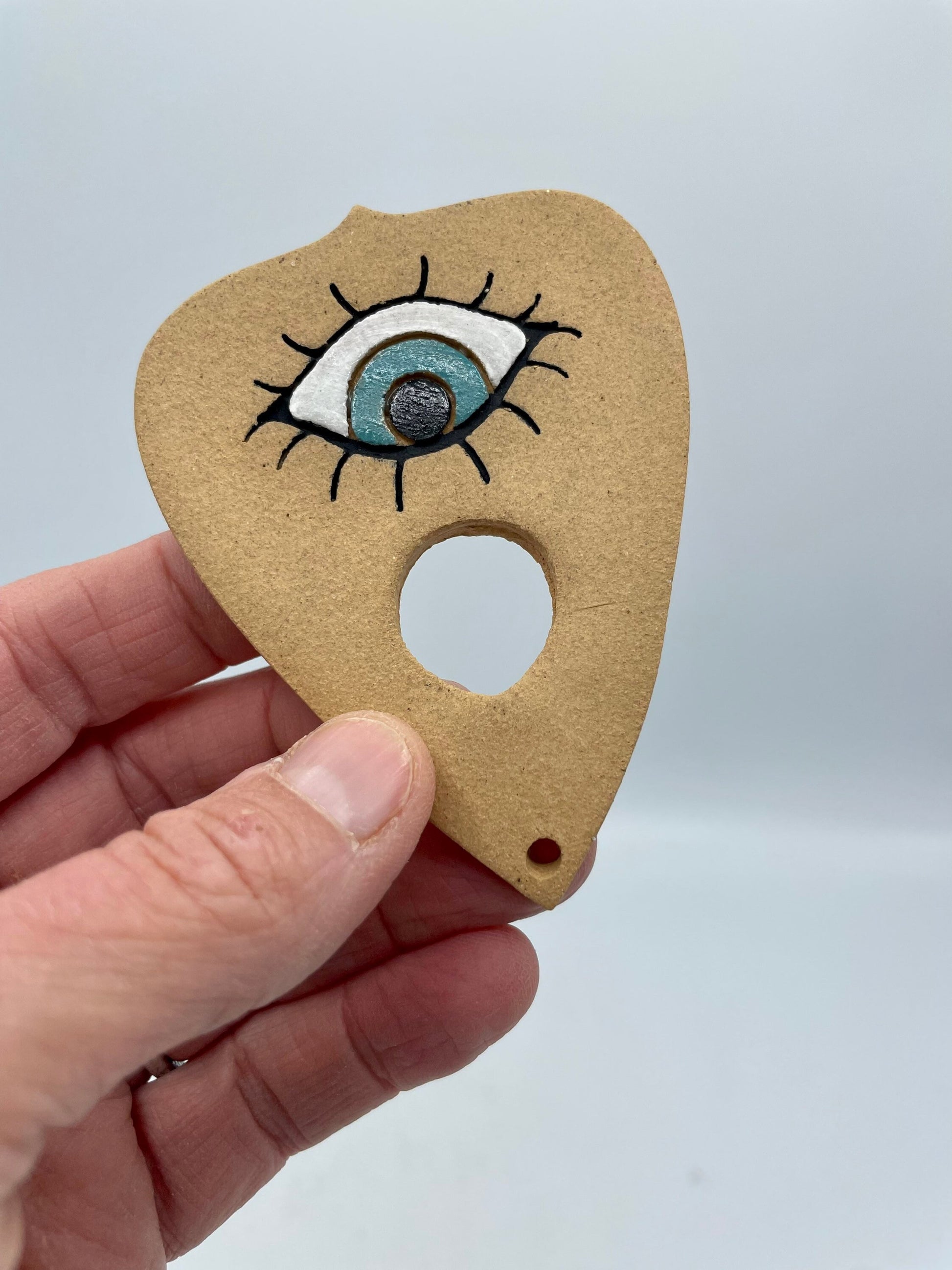 Ceramic evil eye planchette ornament