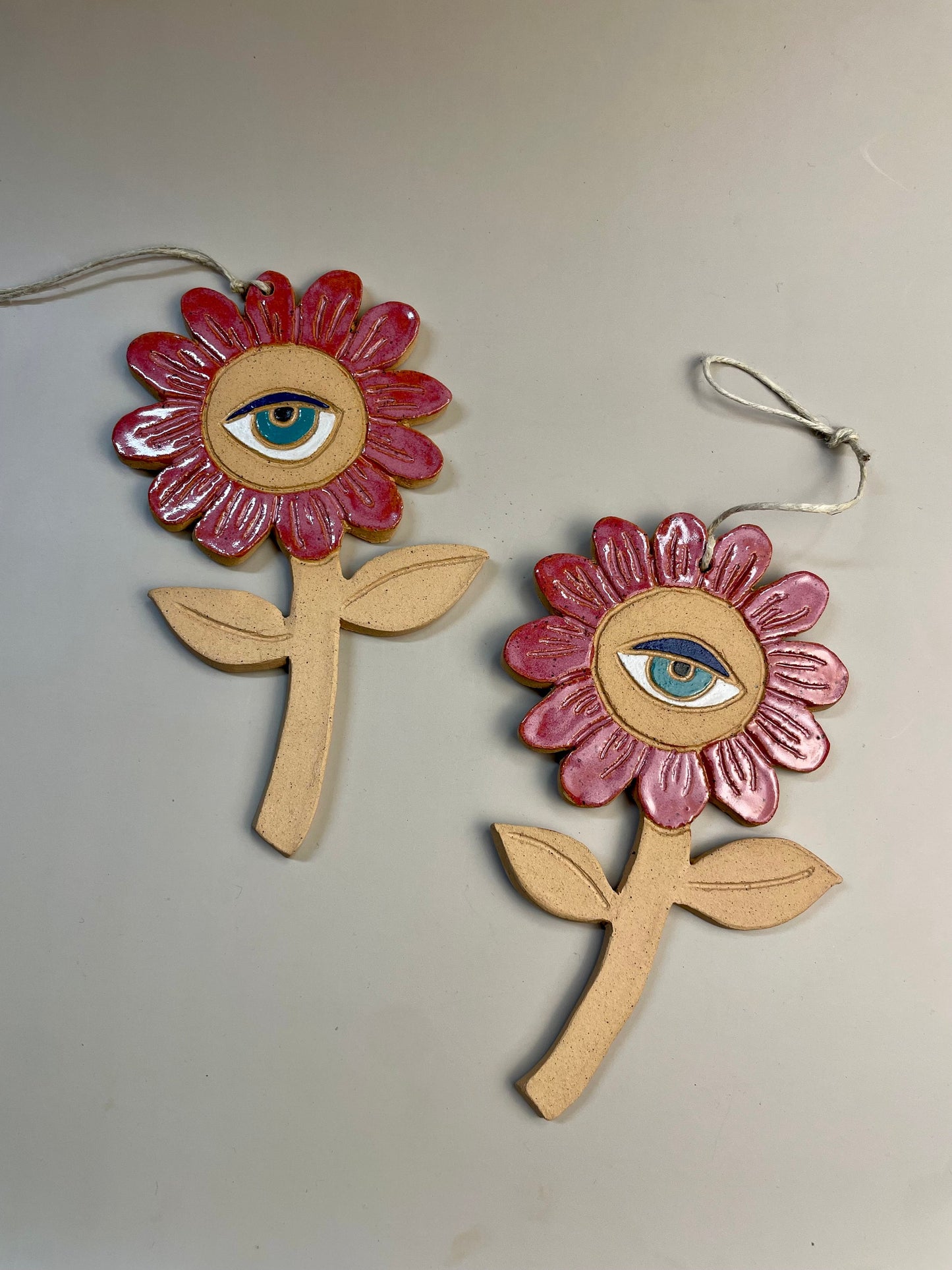 Ceramic flower ornaments with eyes