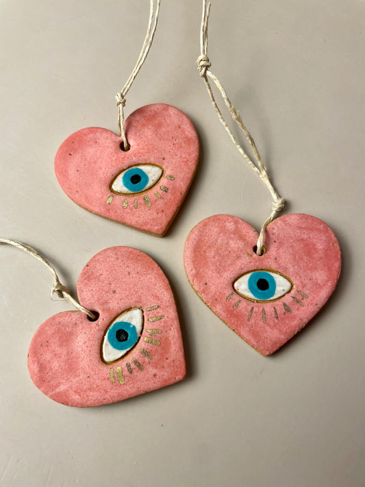 Handmade ceramic heart with eye charms