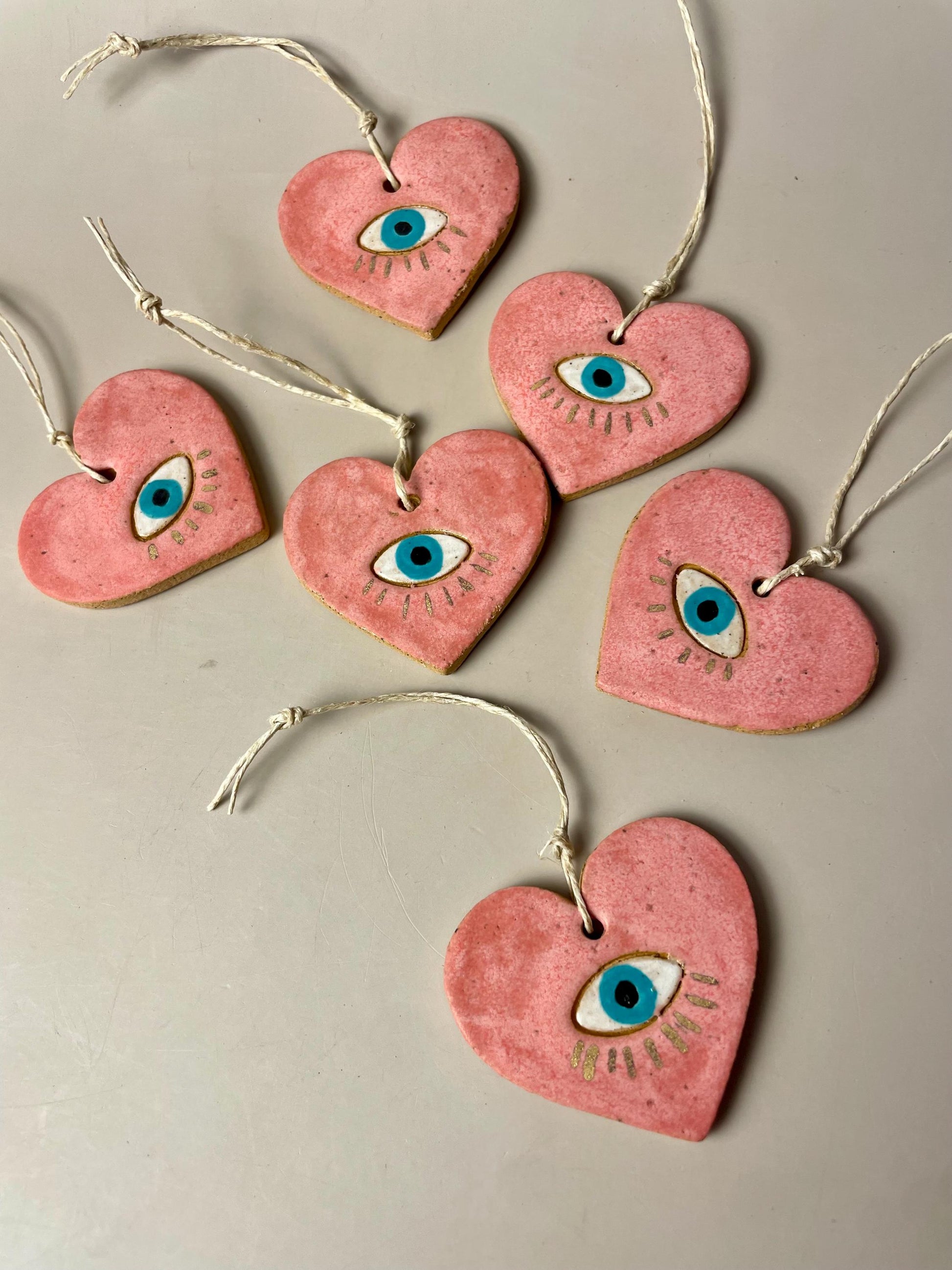 Handmade ceramic heart with eye charms