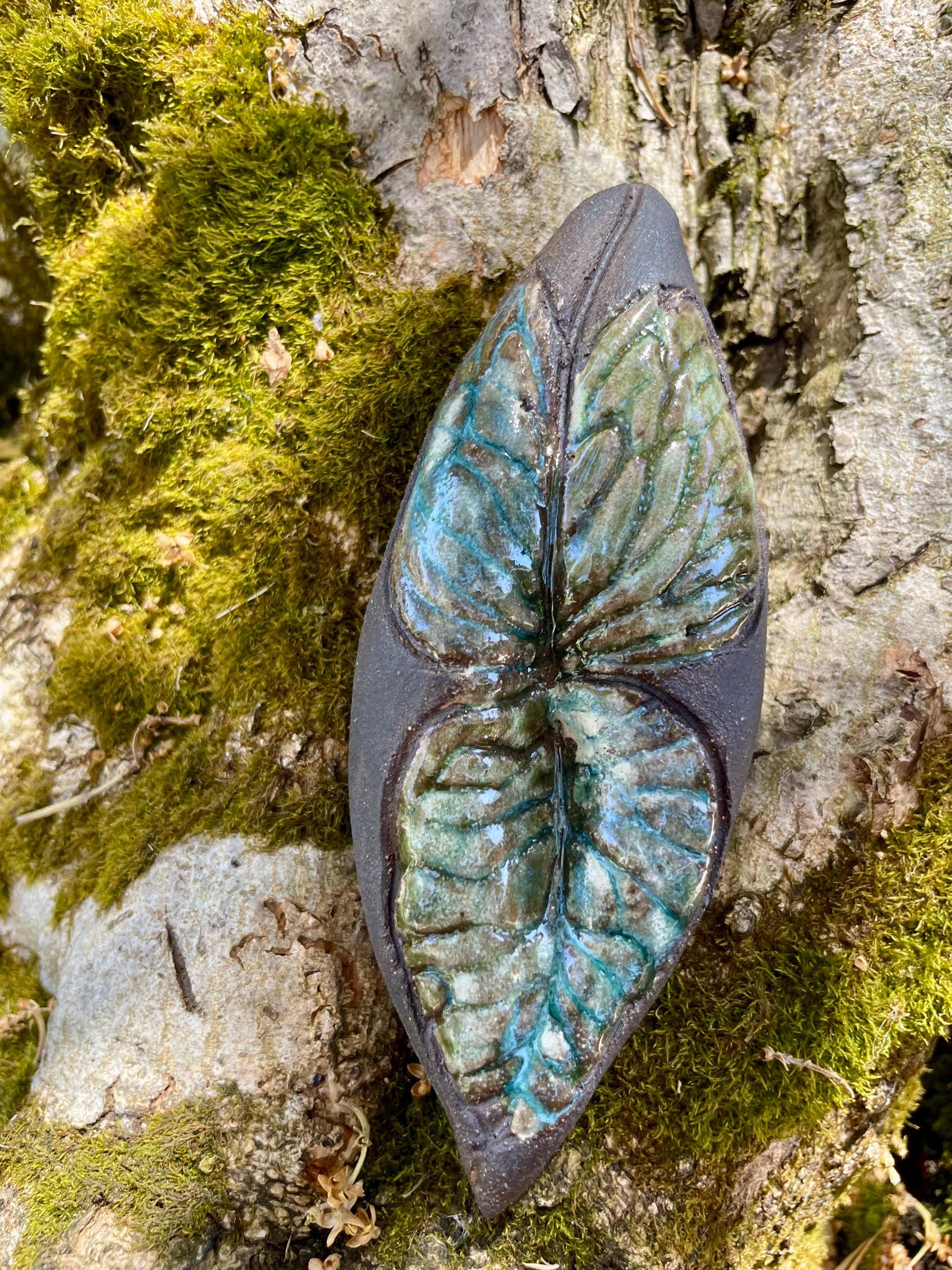Handmade ceramic carved clay winged leaf rattle