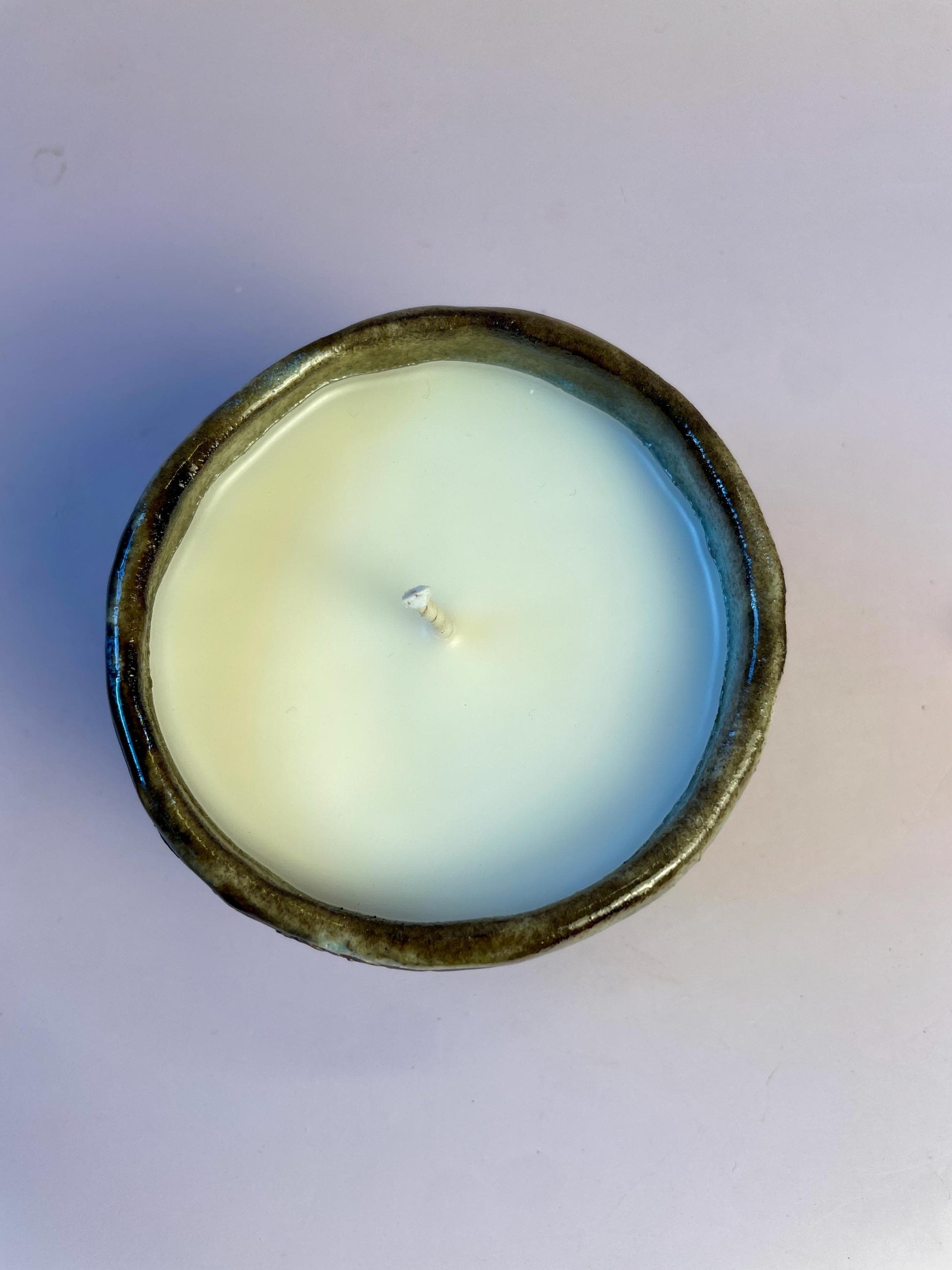 Newgrange-Inspired Ritual Candle – Hand-Carved Dark Clay Vessel, Apricot Wax, Sacred Spiral Symbol | Winter Solstice Edition