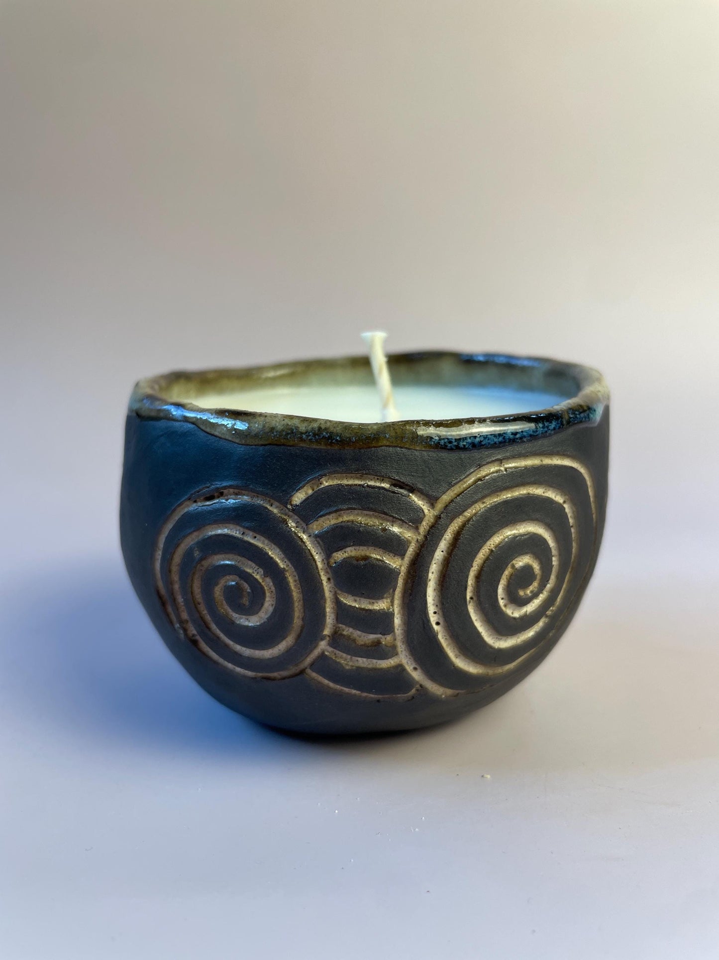 Handmade Ceramic Carved Newgrange Vessel – Dark Clay Ritual Candle, Fragrance-Free, Non-Toxic Apricot Wax, Celtic Spiral