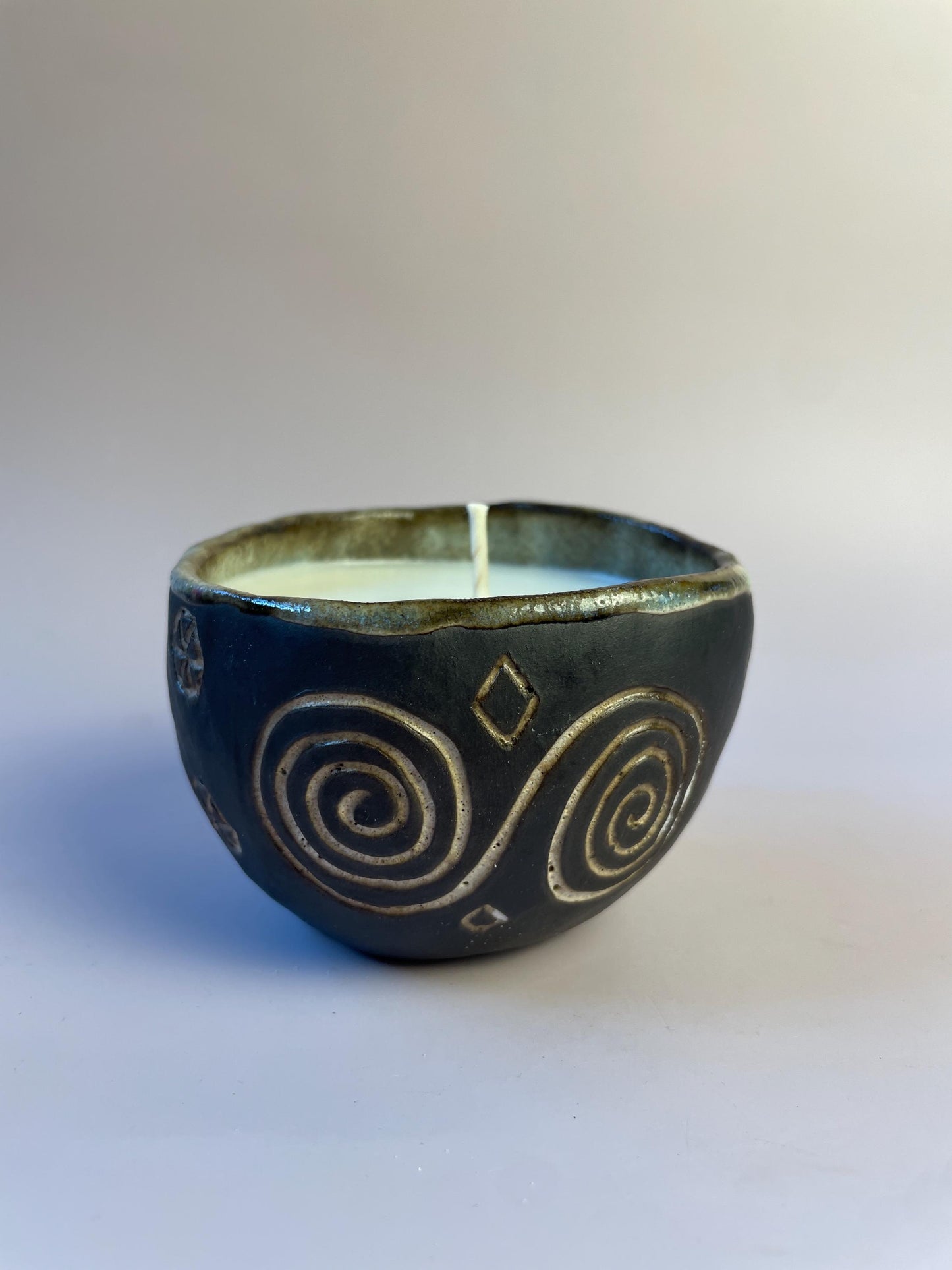 Winter Solstice Candle in Hand Carved Newgrange Vessel – Dark Clay Ritual Candle, Fragrance-Free, Non-Toxic Apricot Wax, Celtic Spiral