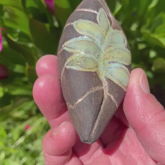 Handmade ceramic carved clay leaf rattle