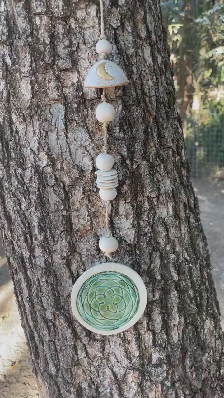 Handmade ceramic Venus starpoint talisman with bell and beads