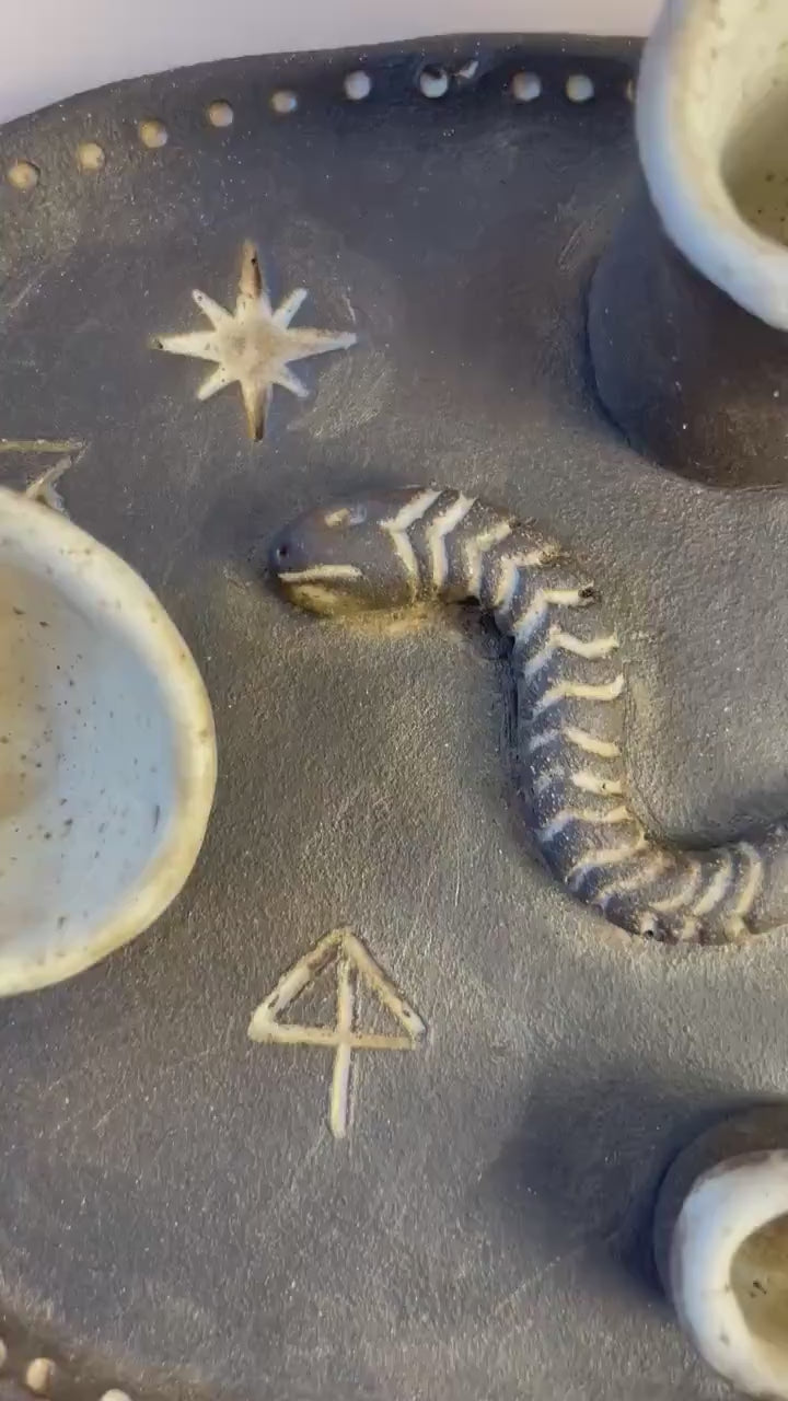 Handmade ceramic four element ritual dish with snake and celestial symbols