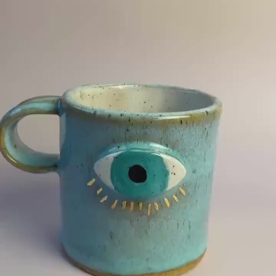 Aqua Eye Mug with Gold Luster Rays – Hand-Built Ceramic Cup | Honey Clay Mug with All-Seeing Eye | Symbolic Artisan Pottery
